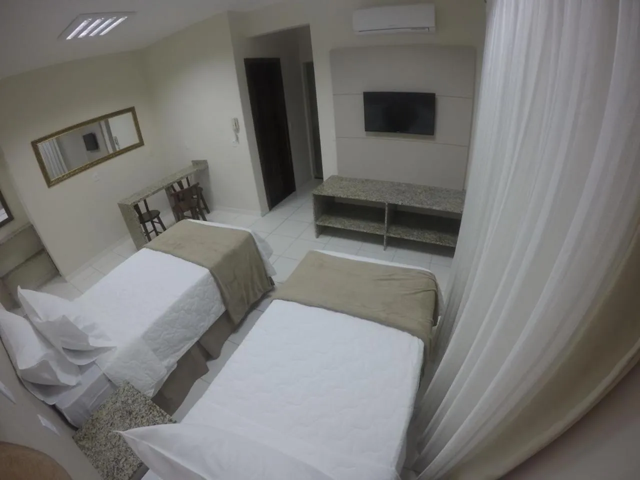 Bed in Pousada Doluar