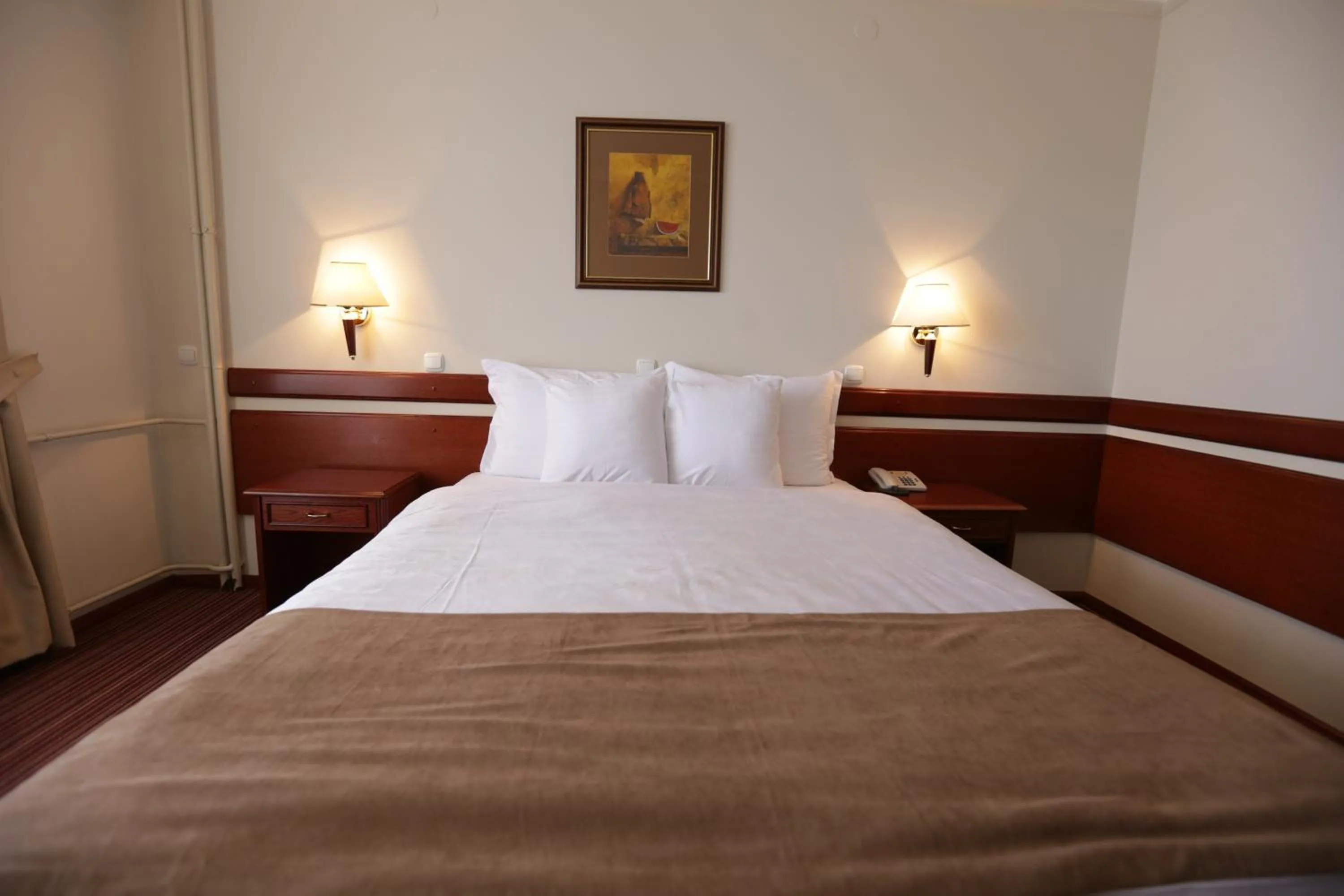 Bed in Hotel Metropol – Metropol Lake Resort