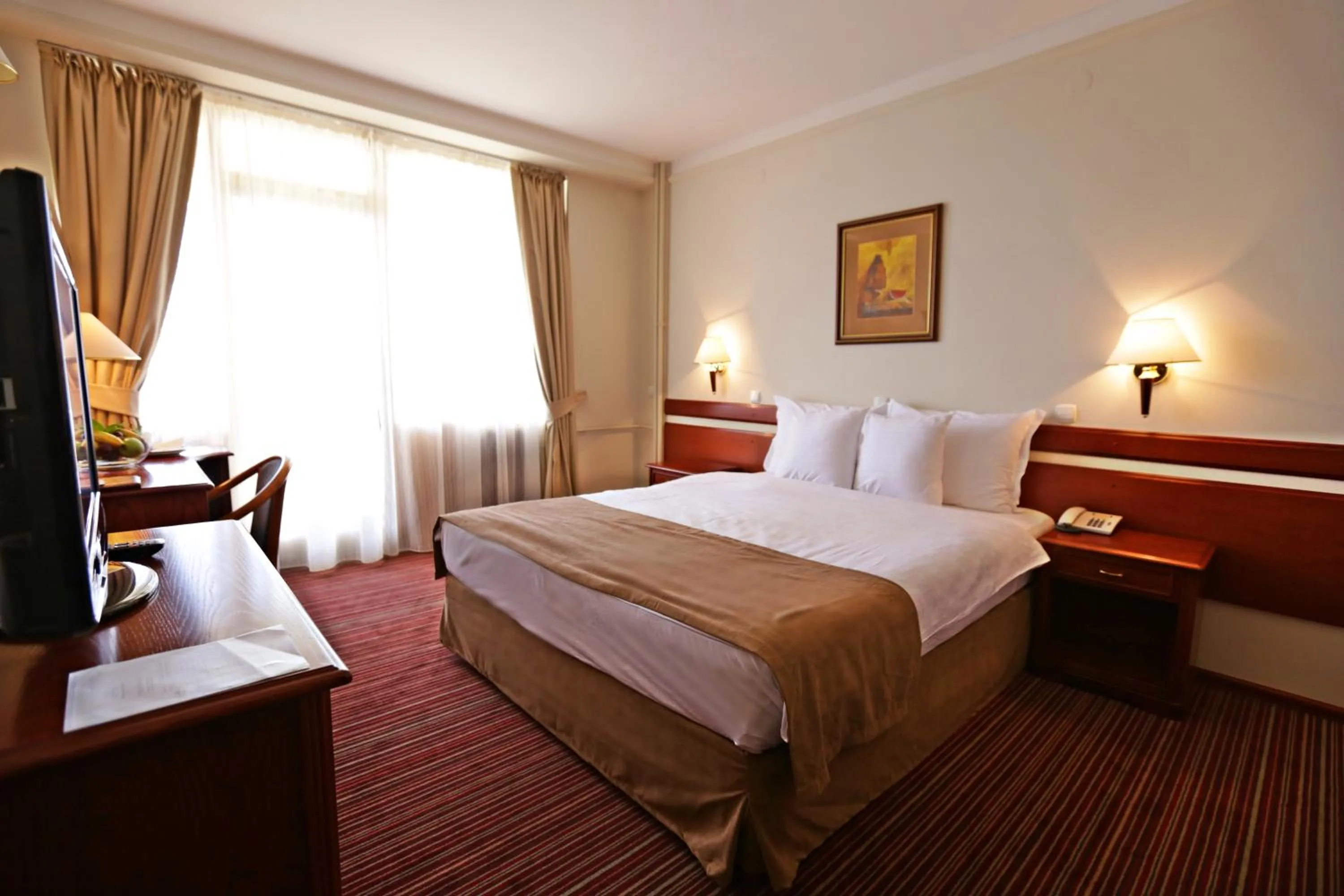 Bed in Hotel Metropol – Metropol Lake Resort