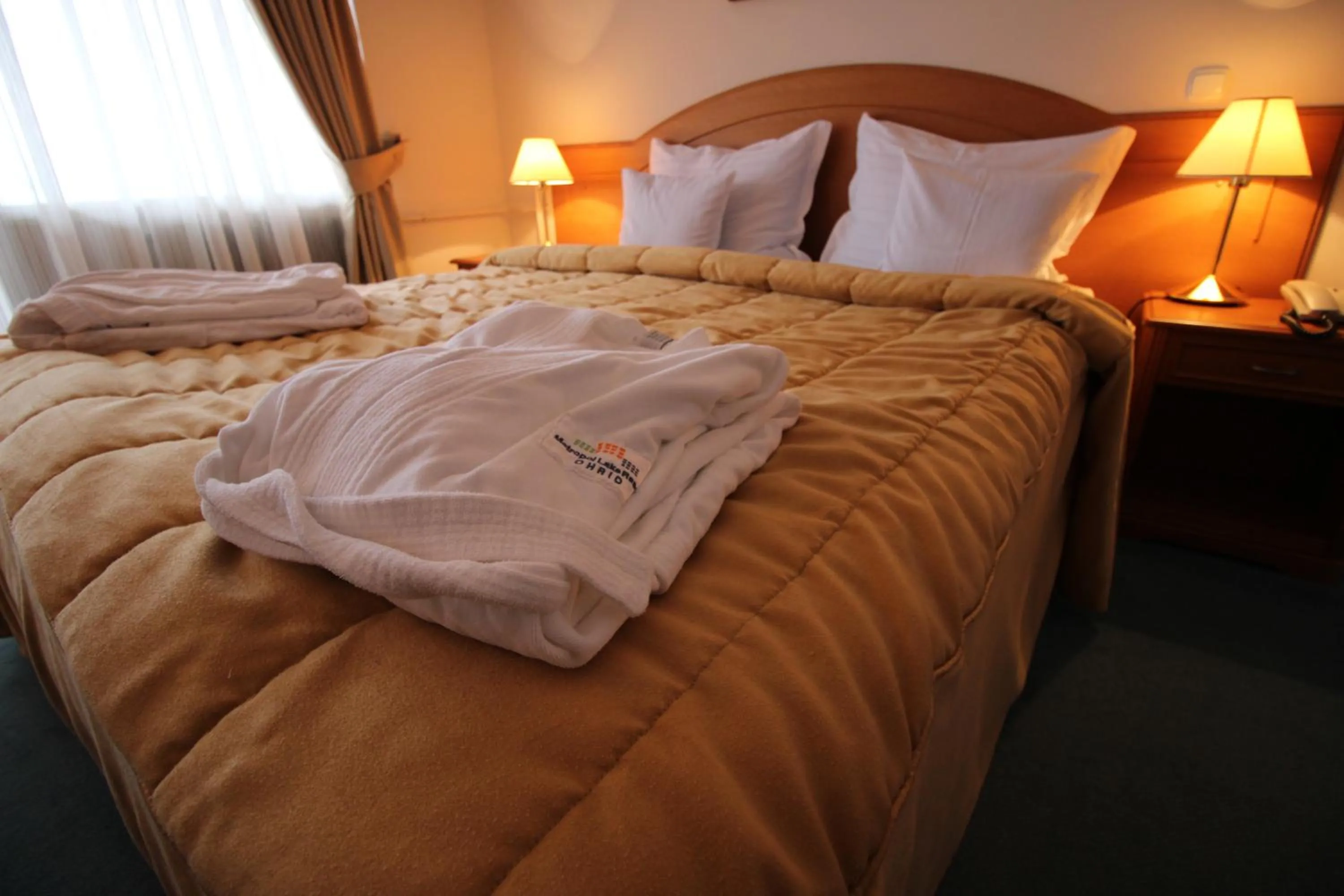 Bed in Hotel Metropol – Metropol Lake Resort