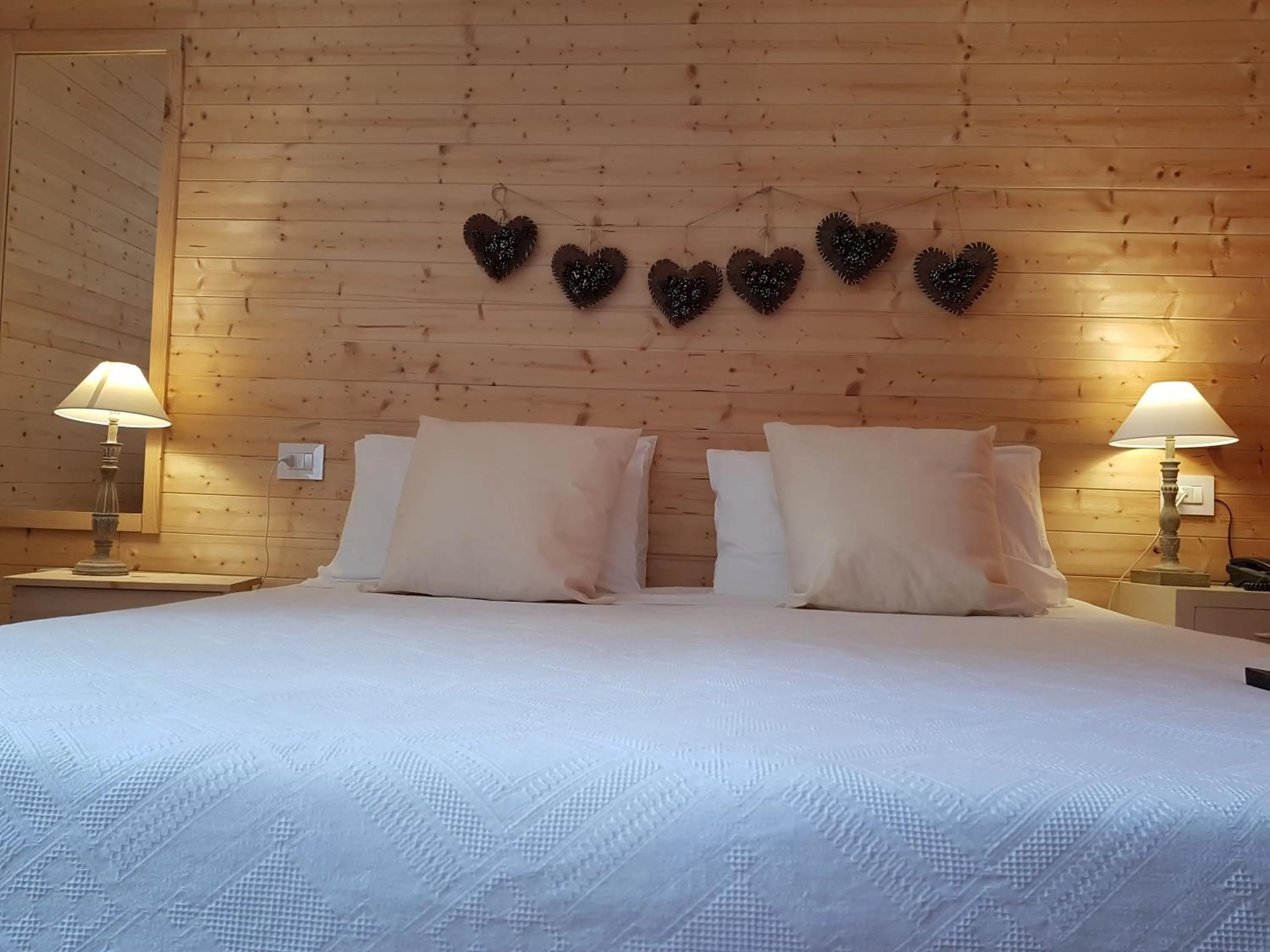 Decorative detail, Bed in Hotel Pedretti