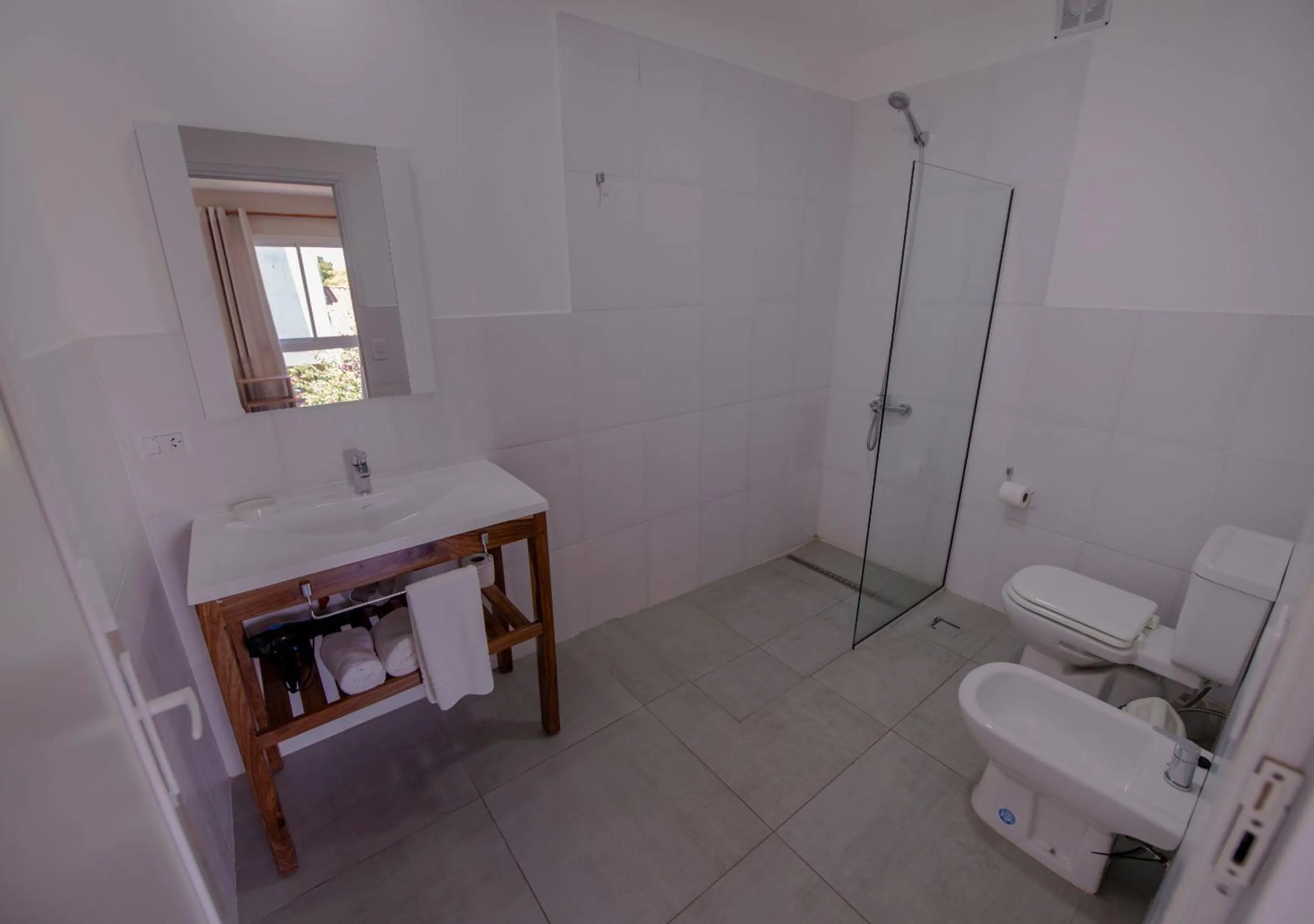 Shower in INGA by DOT Suites