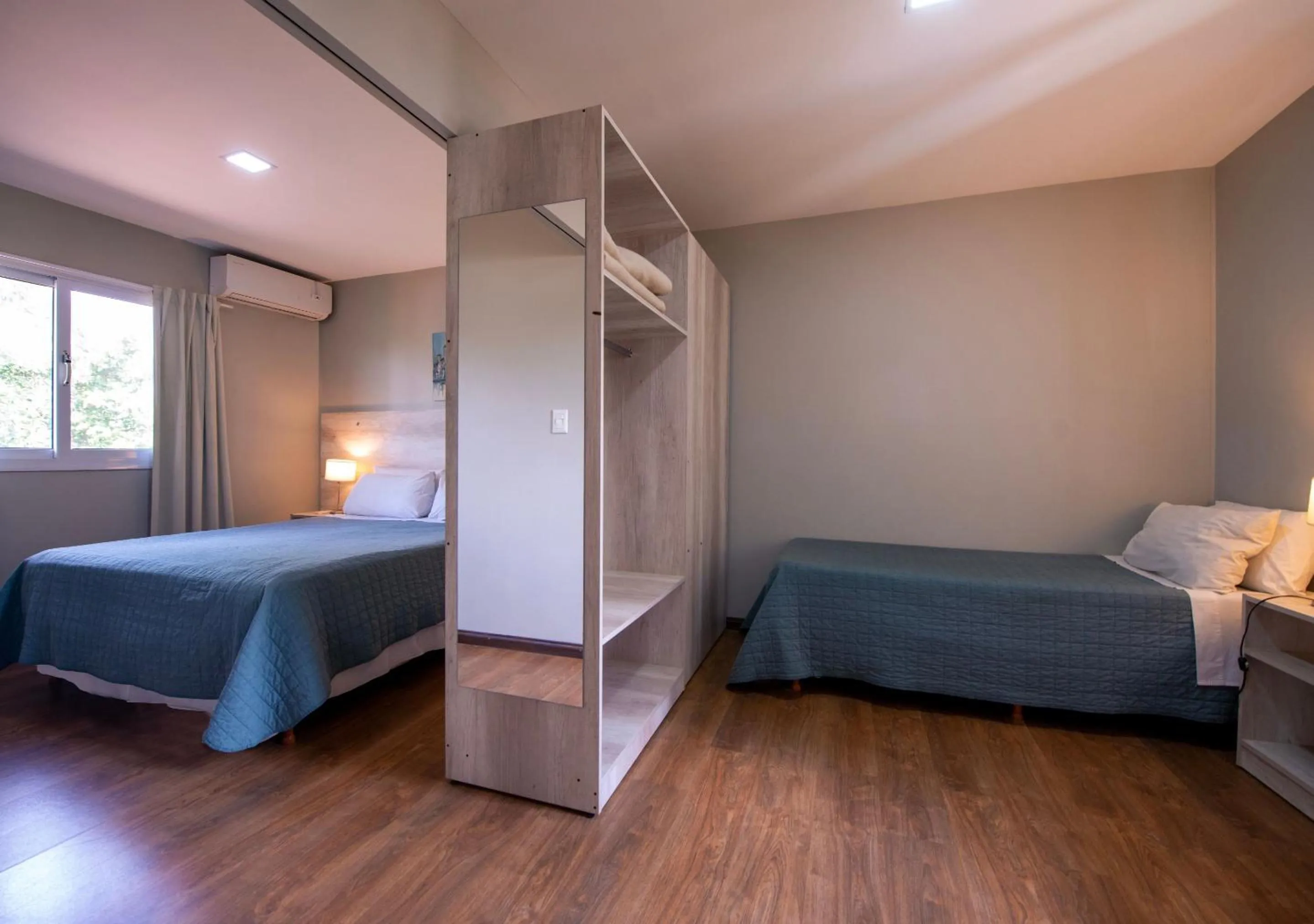 Photo of the whole room, Bed in INGA by DOT Suites