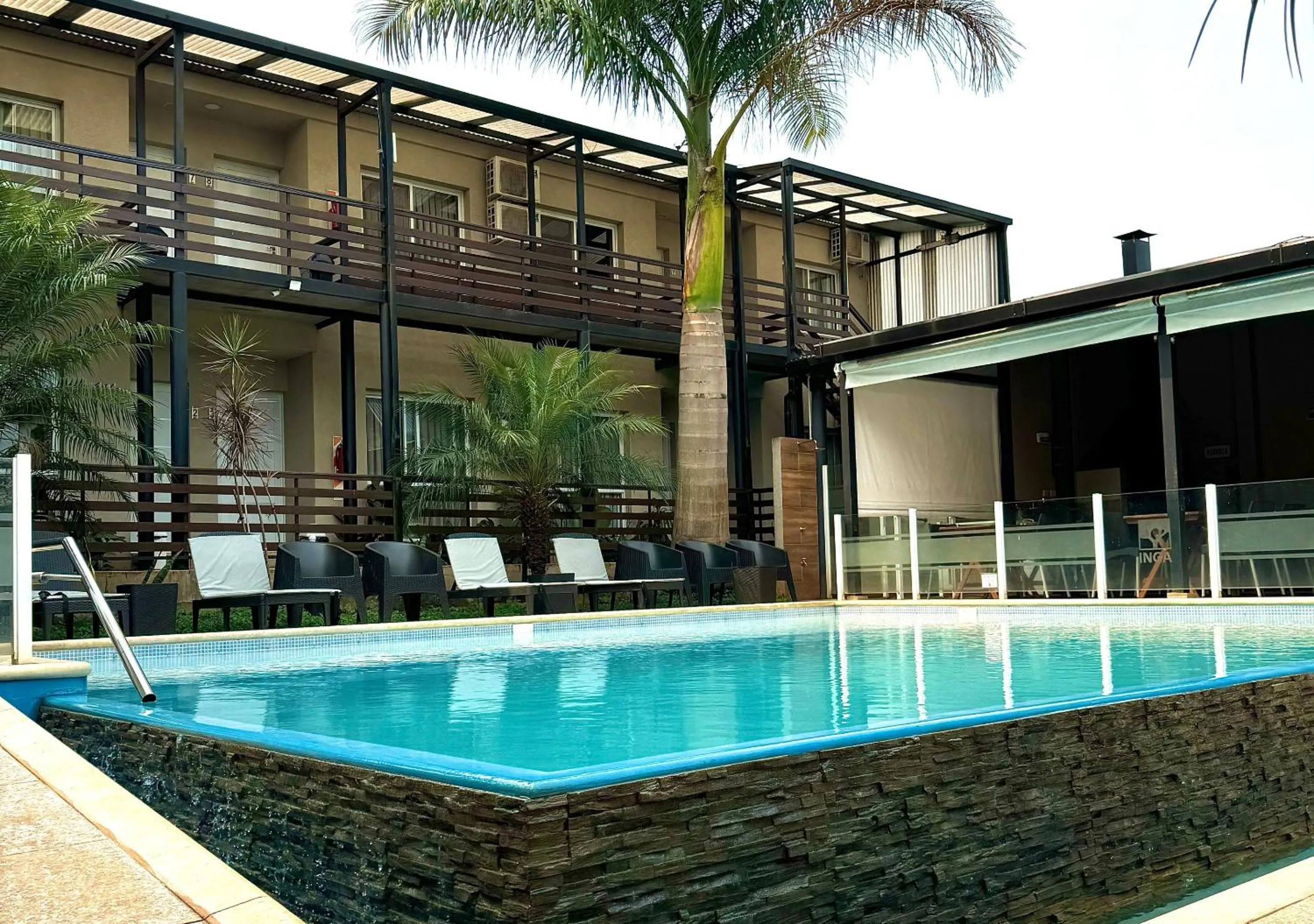 Property building in INGA by DOT Suites