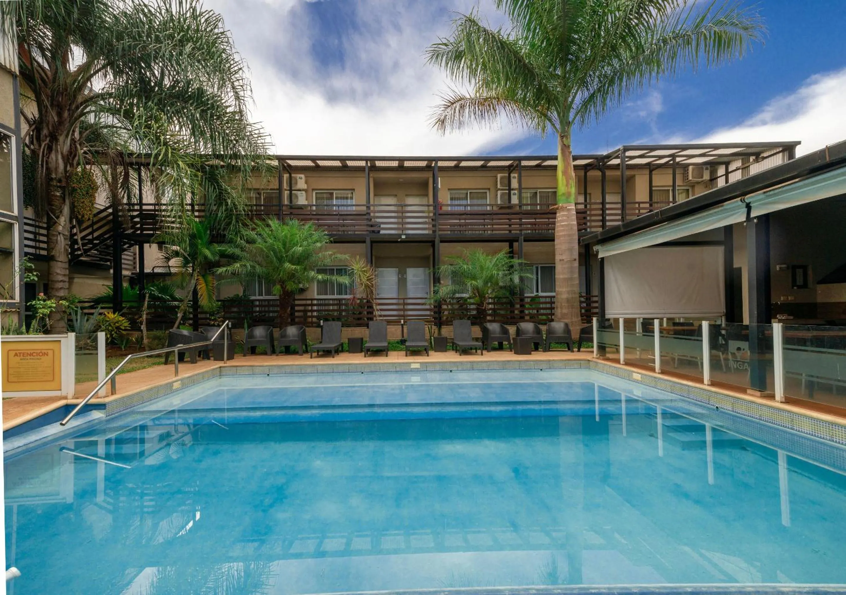 Property building in INGA by DOT Suites