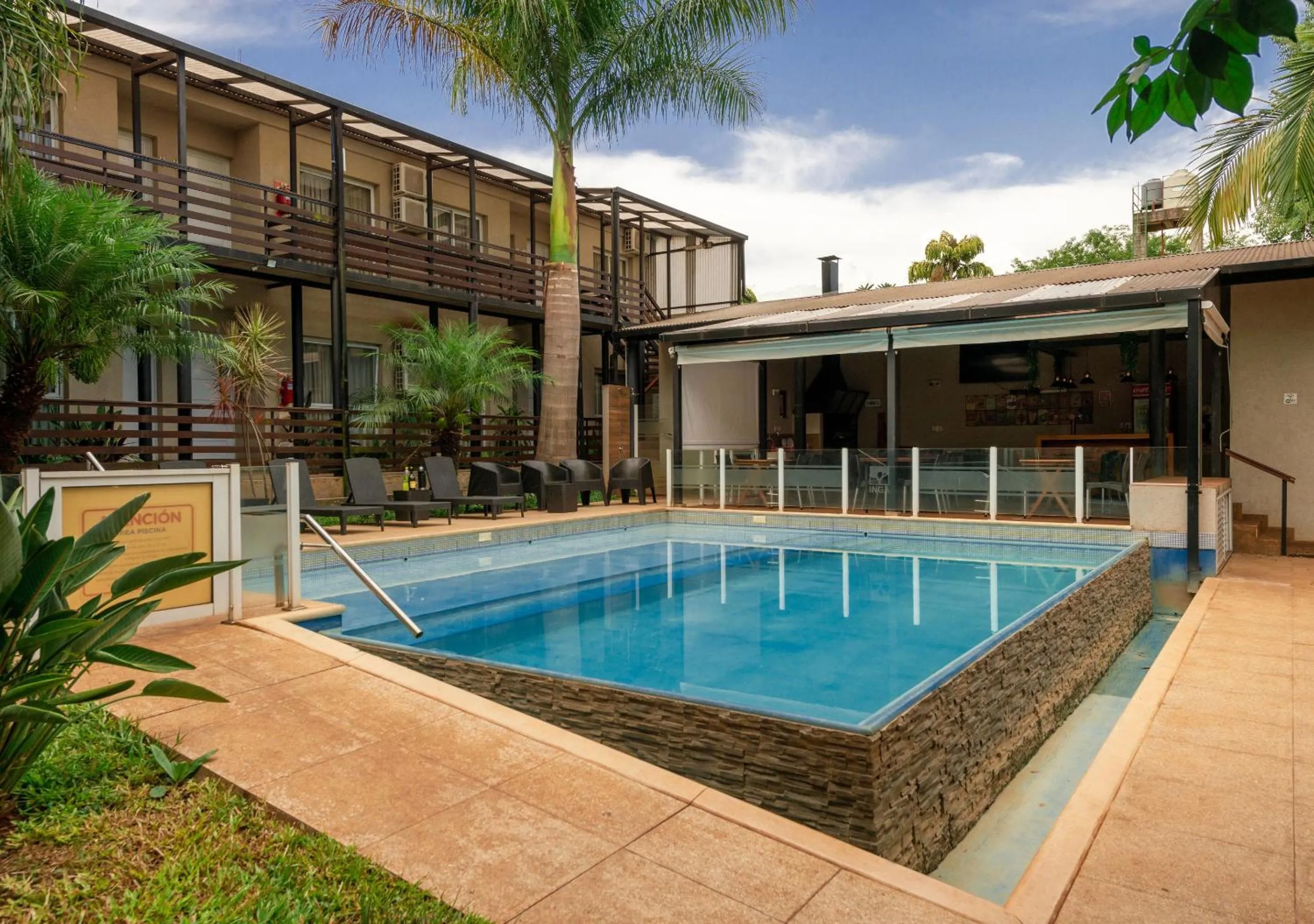 Property building in INGA by DOT Suites