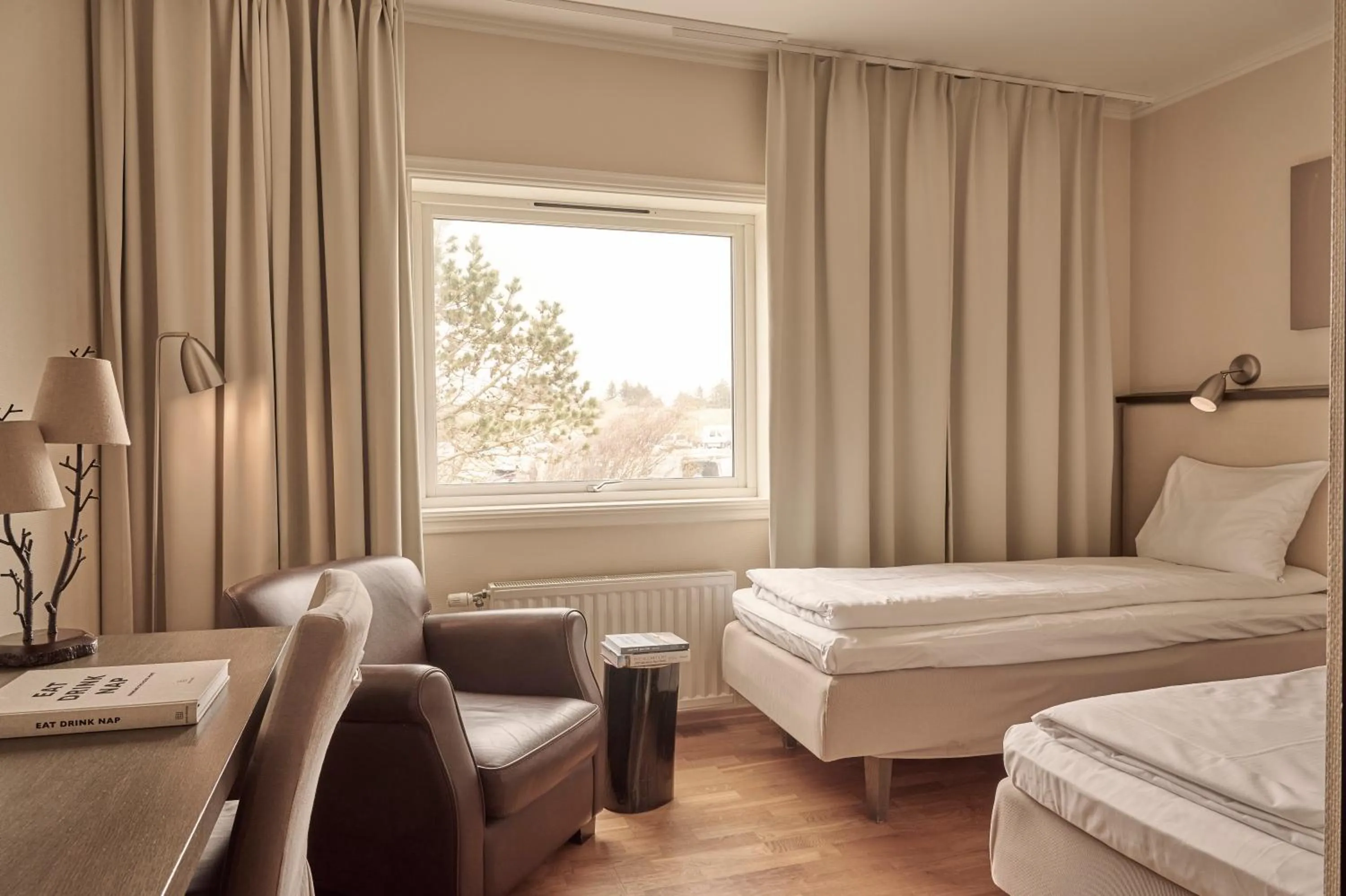 Bed in Sola Strand Hotel