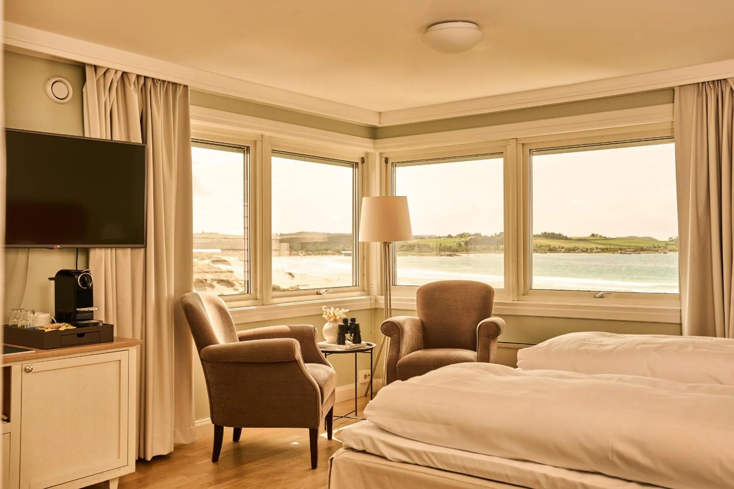 Living room, Bed in Sola Strand Hotel