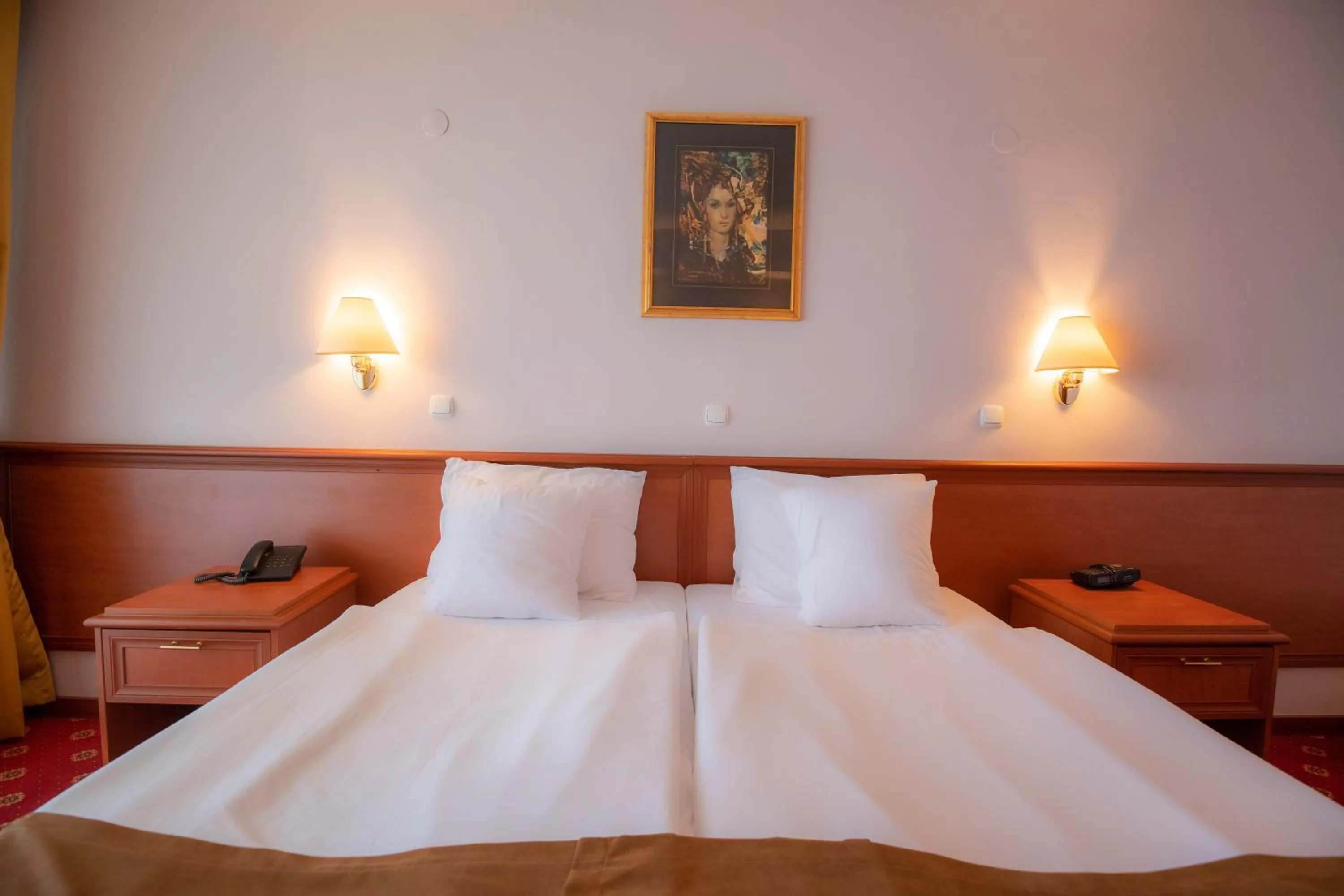 Bed in Hotel Bellevue - Metropol Lake Resort