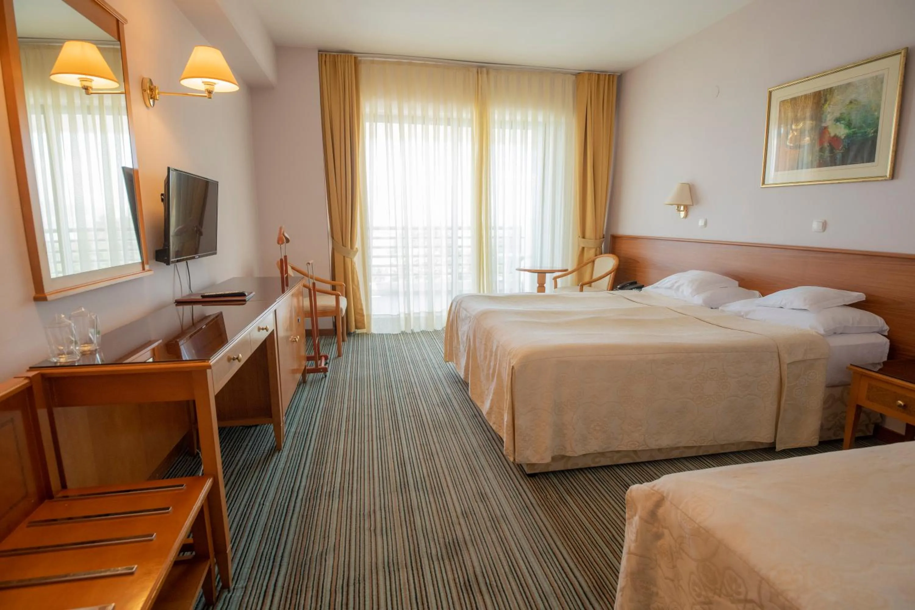 Bed in Hotel Bellevue - Metropol Lake Resort