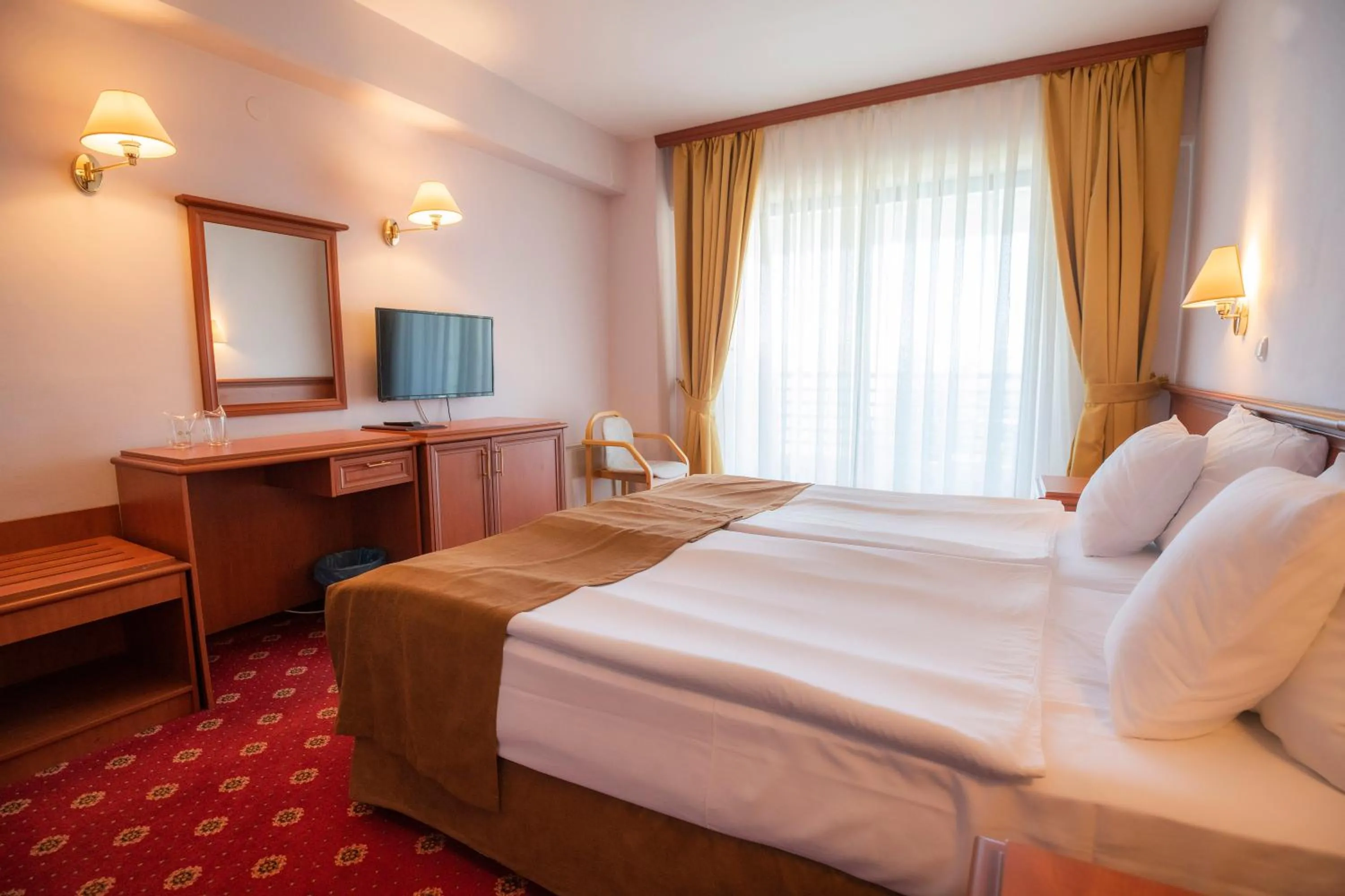 Bed in Hotel Bellevue - Metropol Lake Resort