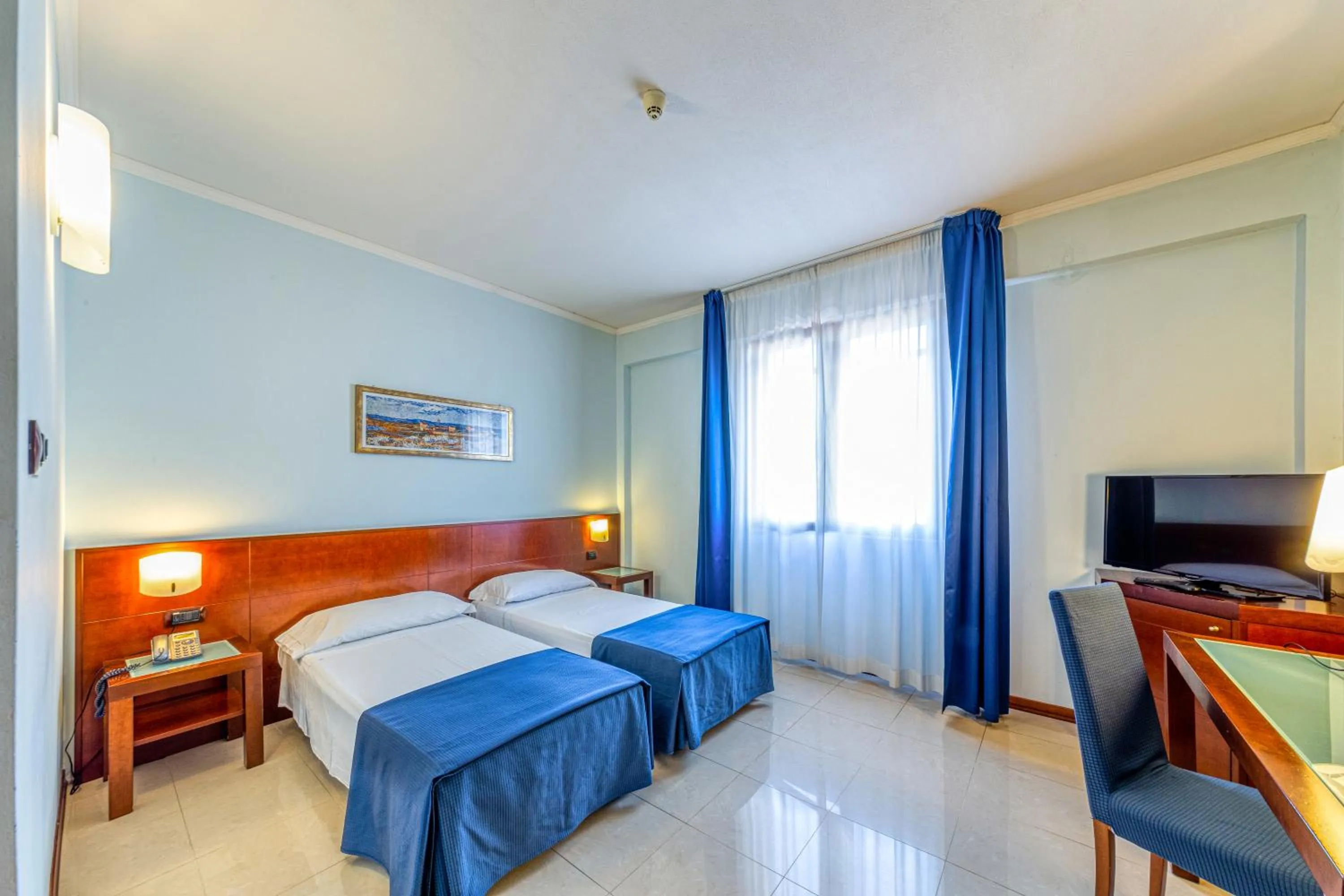 Bed in Hotel Le Torri