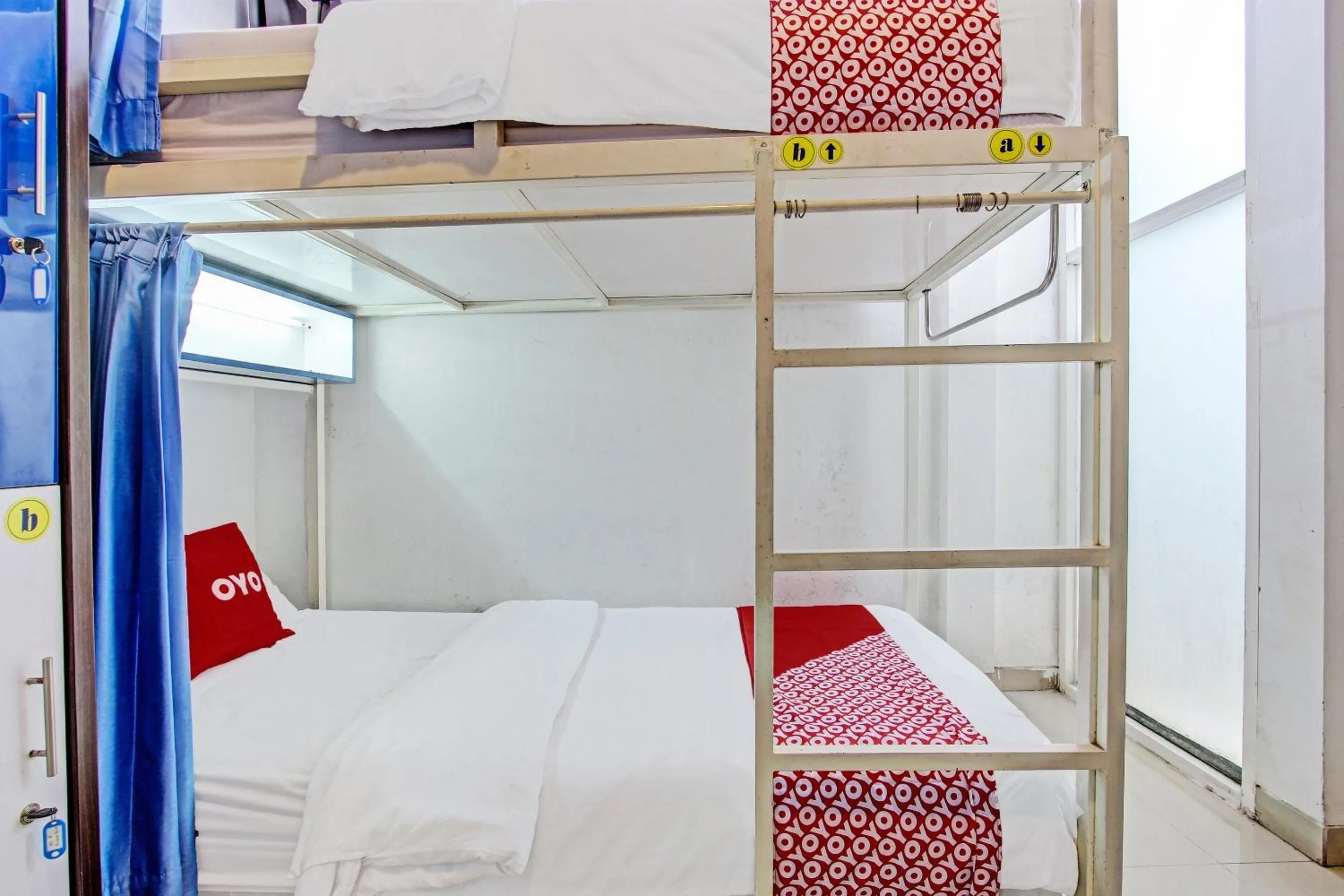 Bedroom in OYO 91952 Oase Hostel