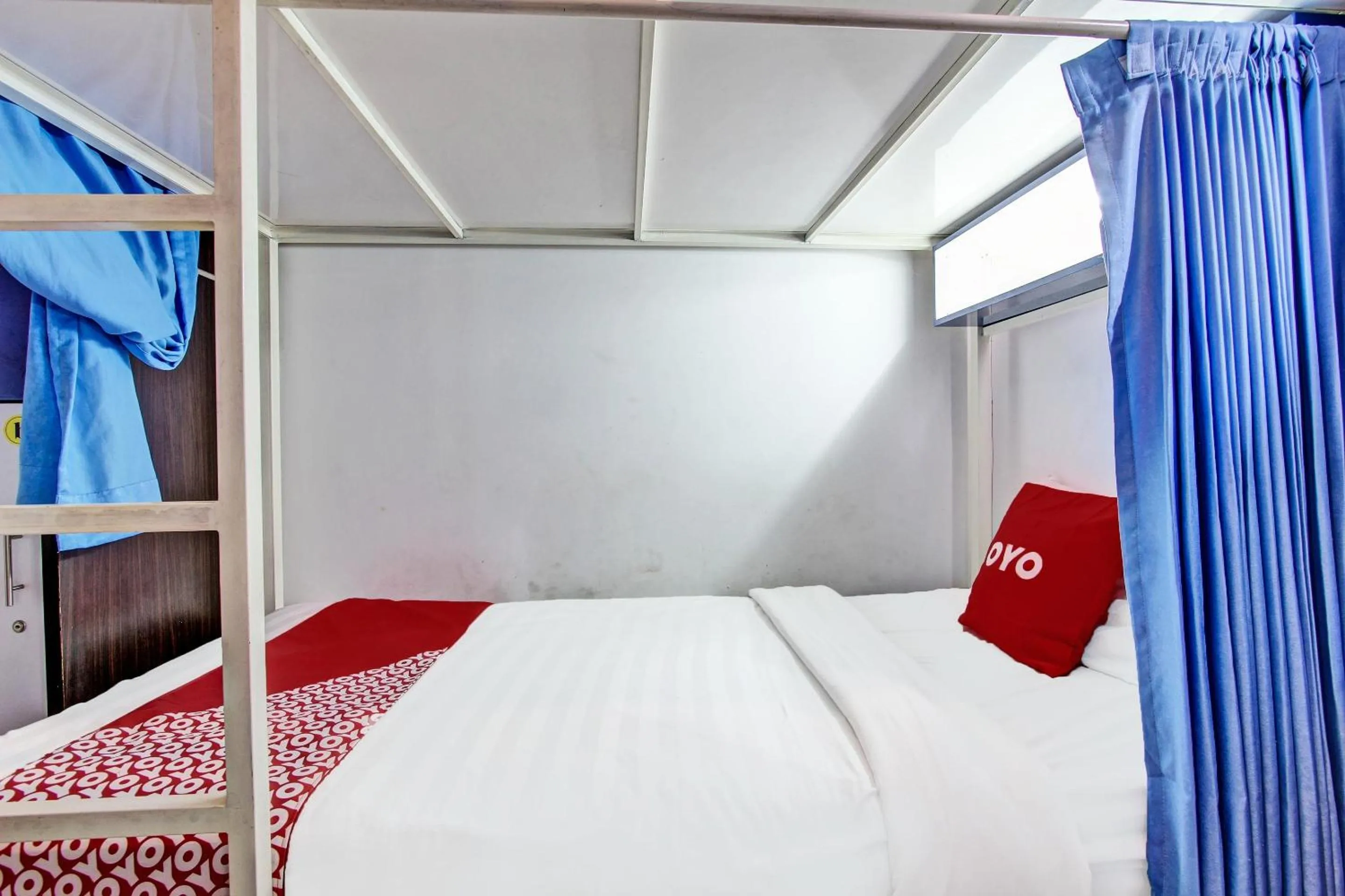 Bedroom in OYO 91952 Oase Hostel