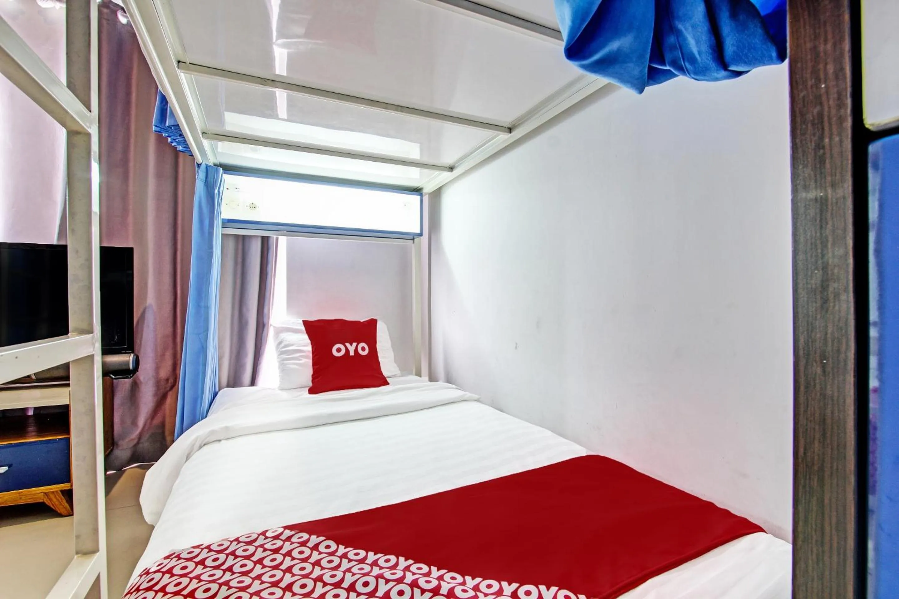 Bedroom in OYO 91952 Oase Hostel
