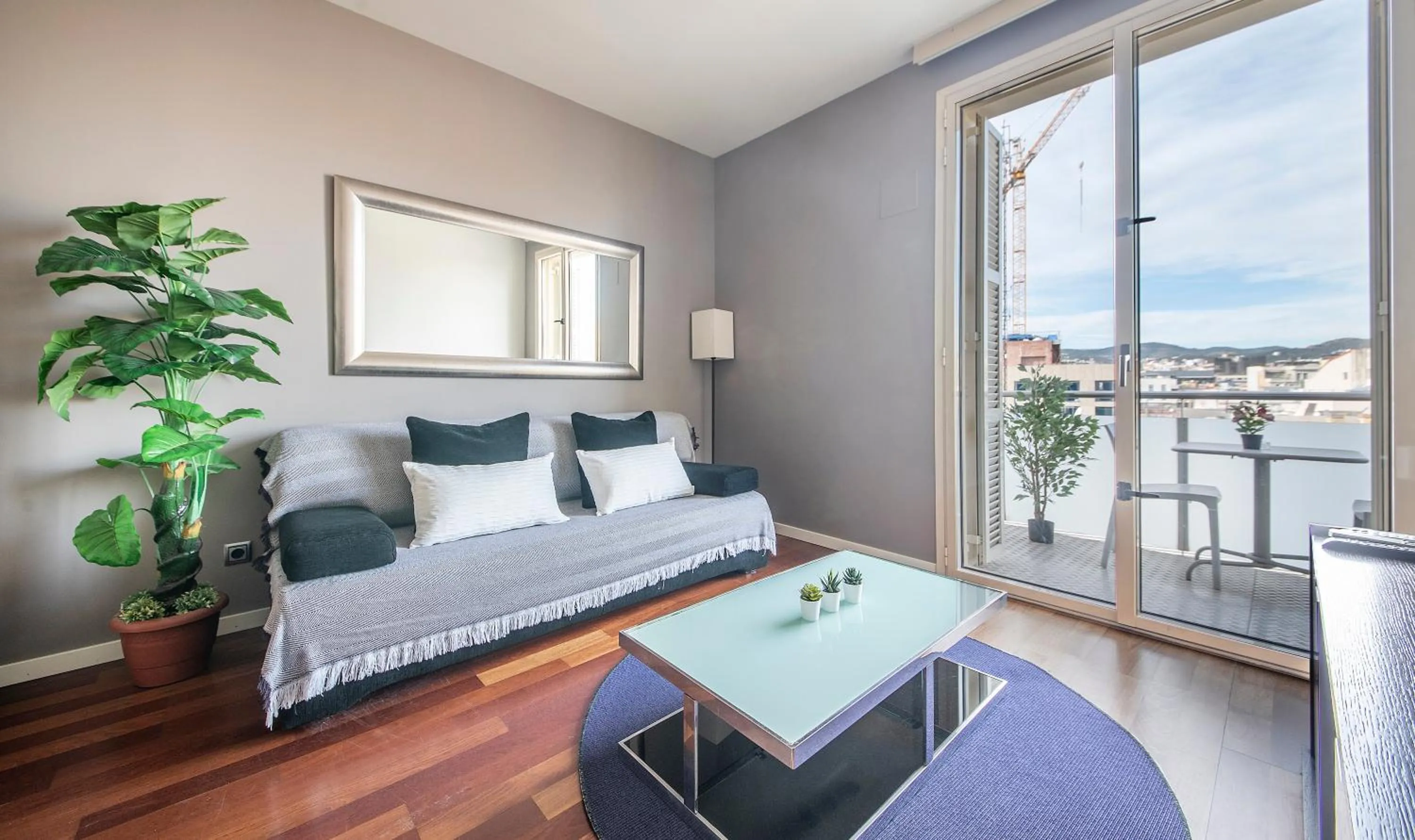 Living room, Bed in You Stylish City Center Apartments