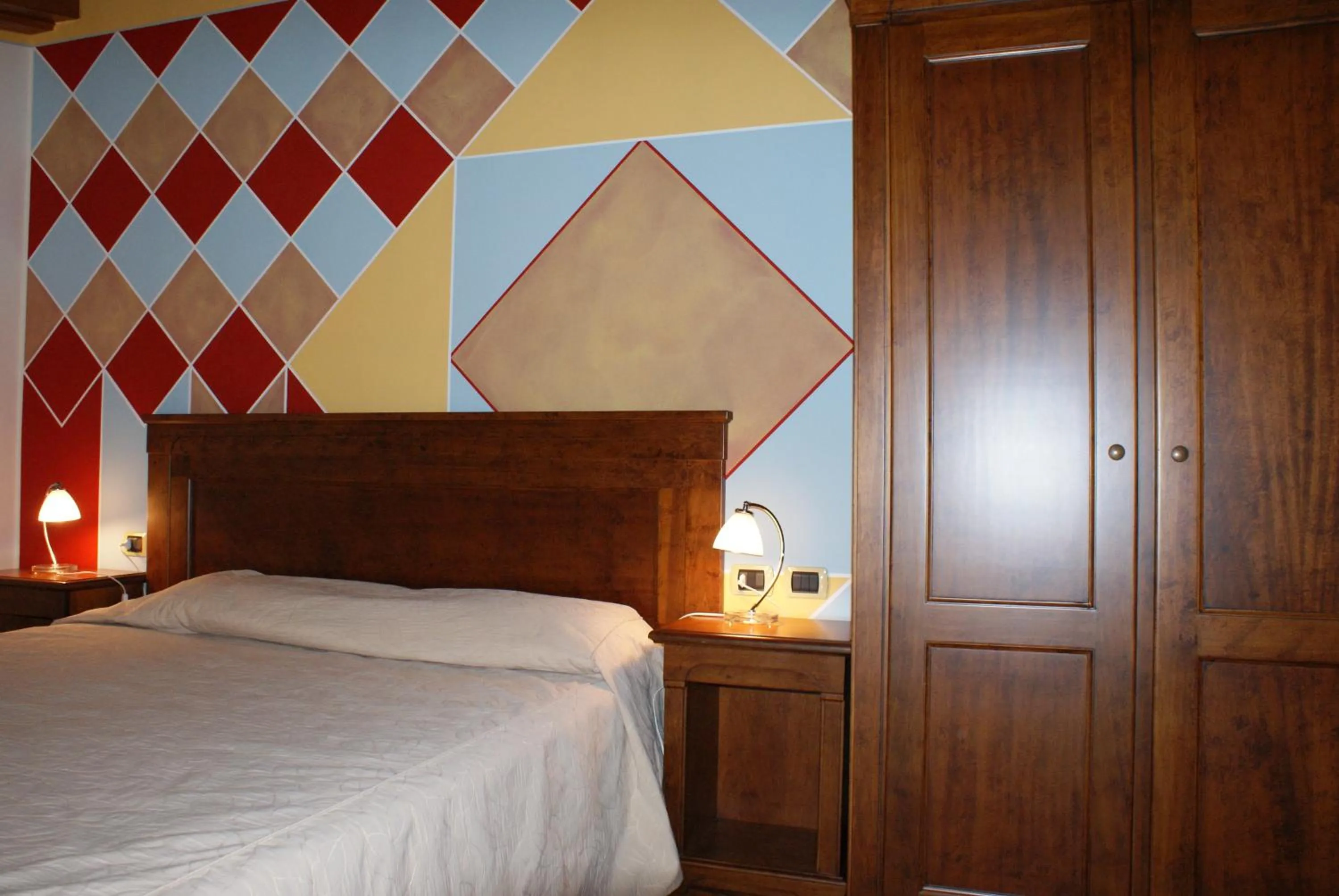 Decorative detail, Bed in Relais Corte Pontigliardo