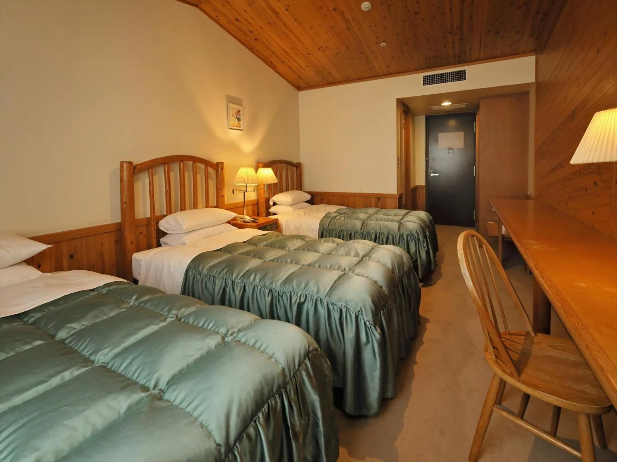 Photo of the whole room, Bed in Kibi Kogen Resort Hotel