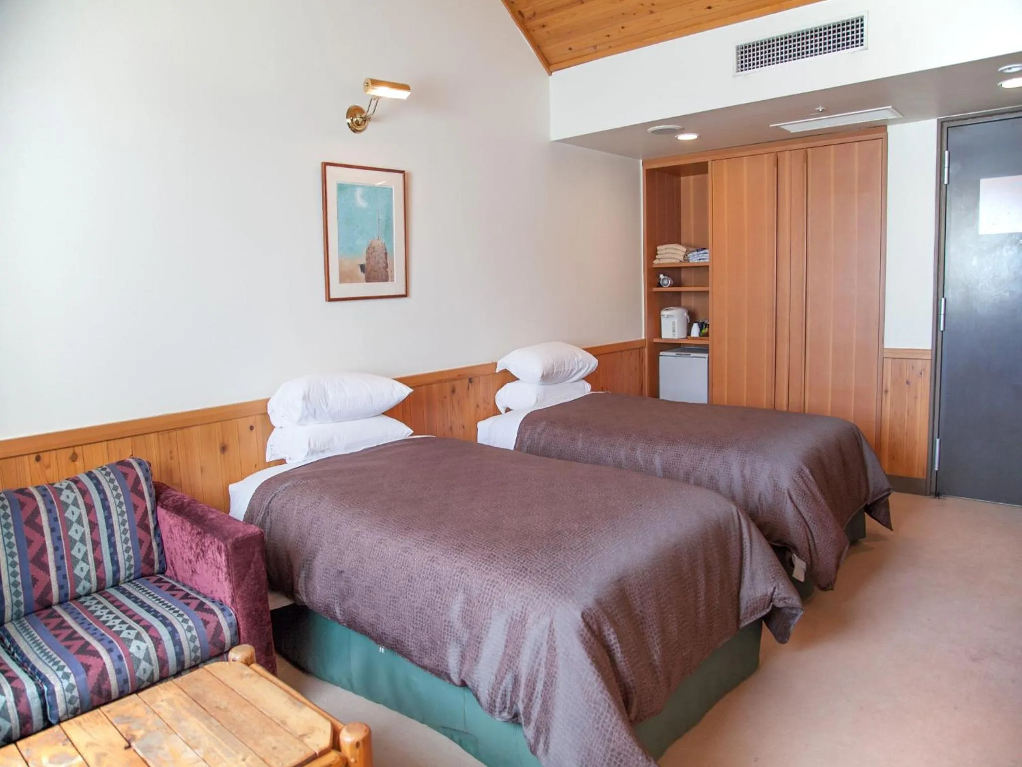 Bed in Kibi Kogen Resort Hotel