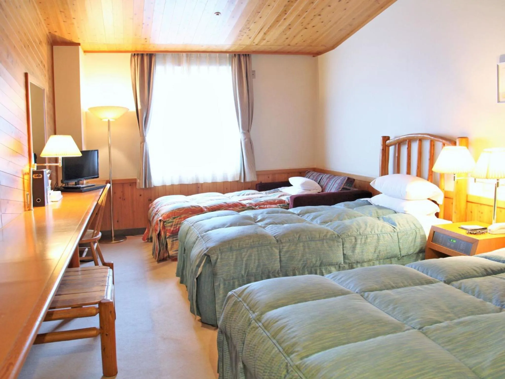 Photo of the whole room, Bed in Kibi Kogen Resort Hotel