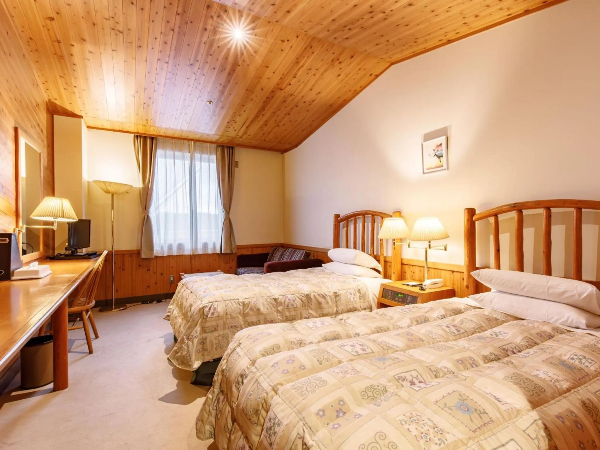 Photo of the whole room, Bed in Kibi Kogen Resort Hotel