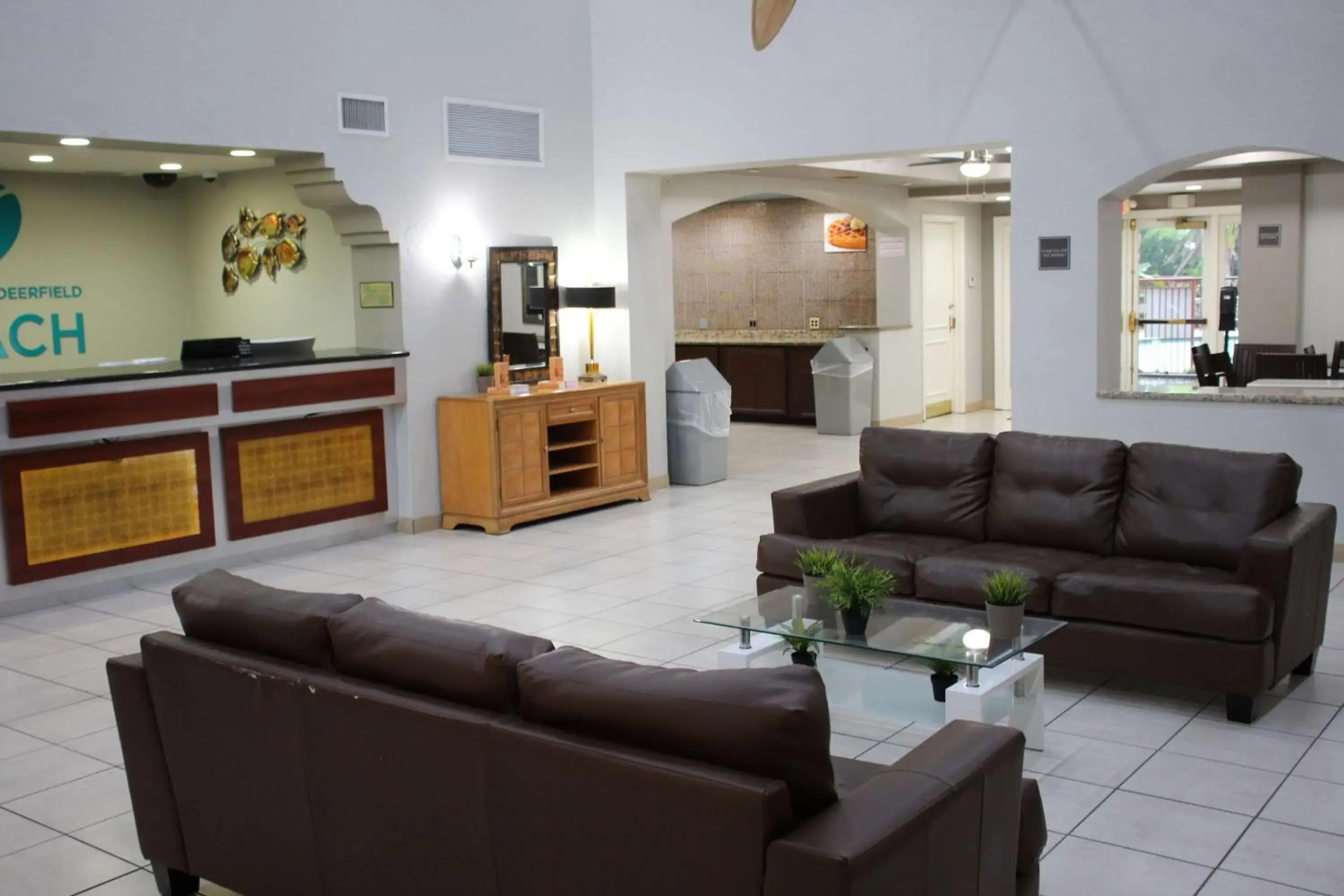 Lobby or reception in Boca Suites Deerfield Beach; SureStay Collection by BW Lobby or reception in Boca Suites Deerfield Beach; SureStay Collection by BW