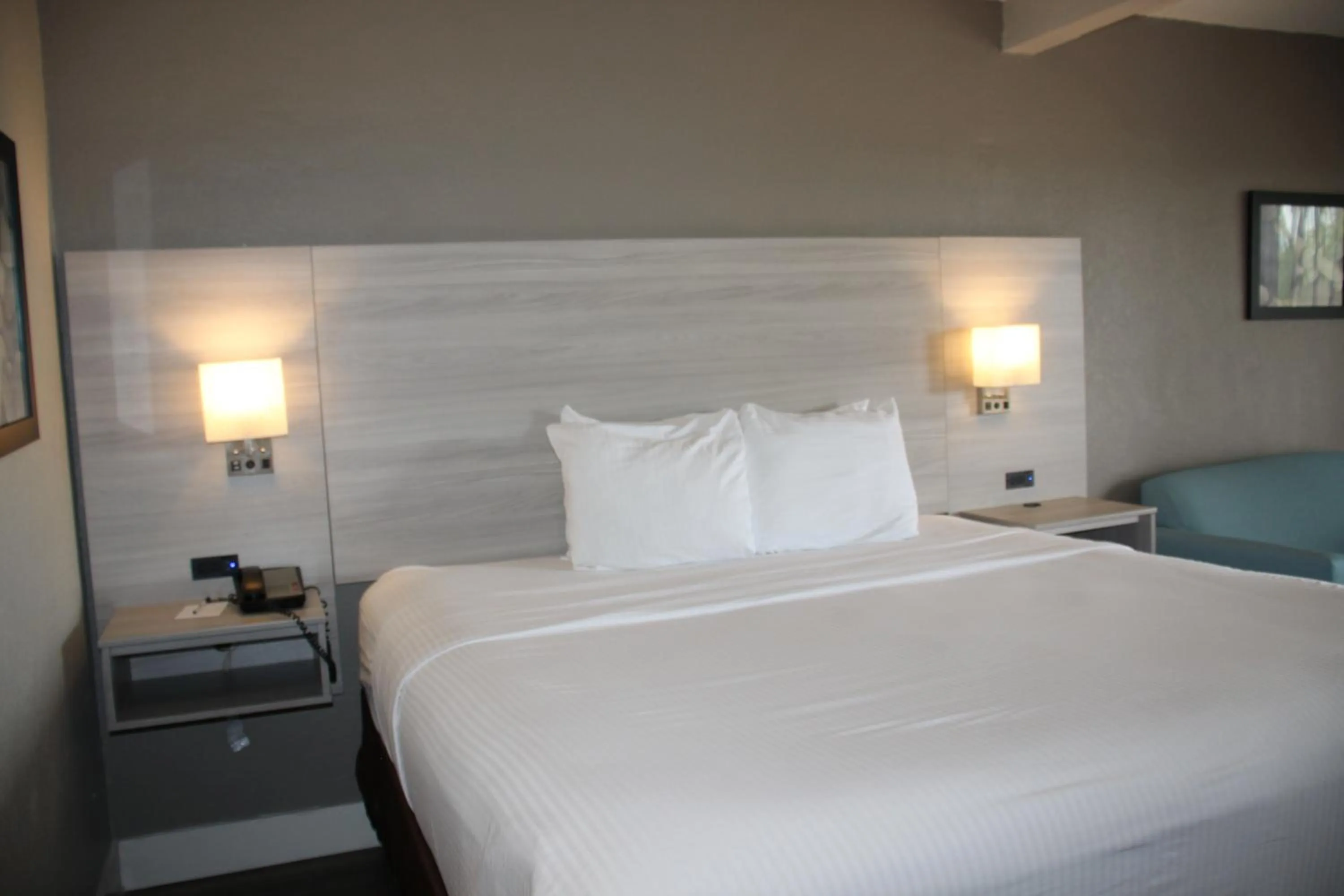 Bed in Boca Suites Deerfield Beach; SureStay Collection by BW