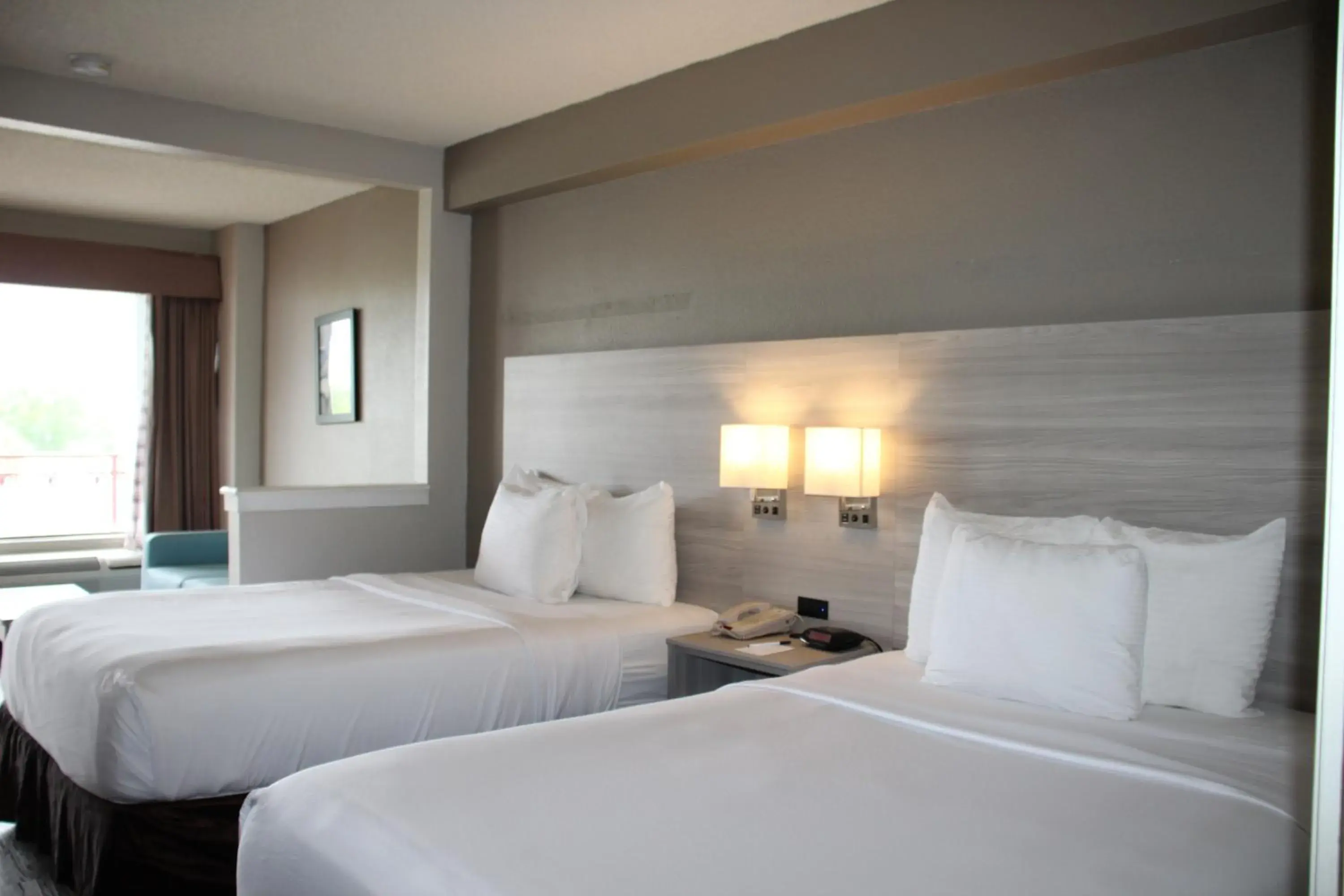 Bed in Boca Suites Deerfield Beach; SureStay Collection by BW Bed in Boca Suites Deerfield Beach; SureStay Collection by BW