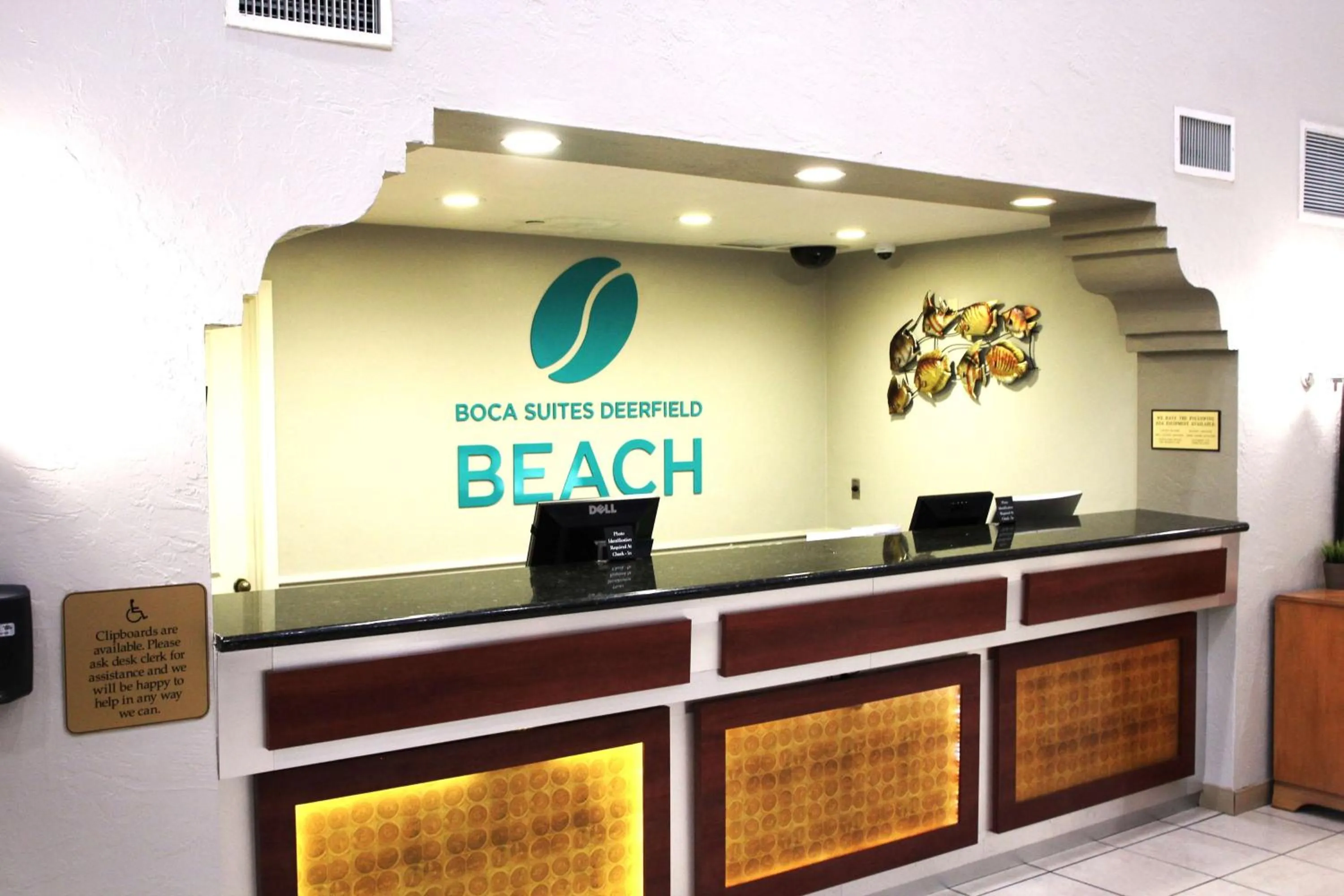 Lobby or reception in Boca Suites Deerfield Beach; SureStay Collection by BW