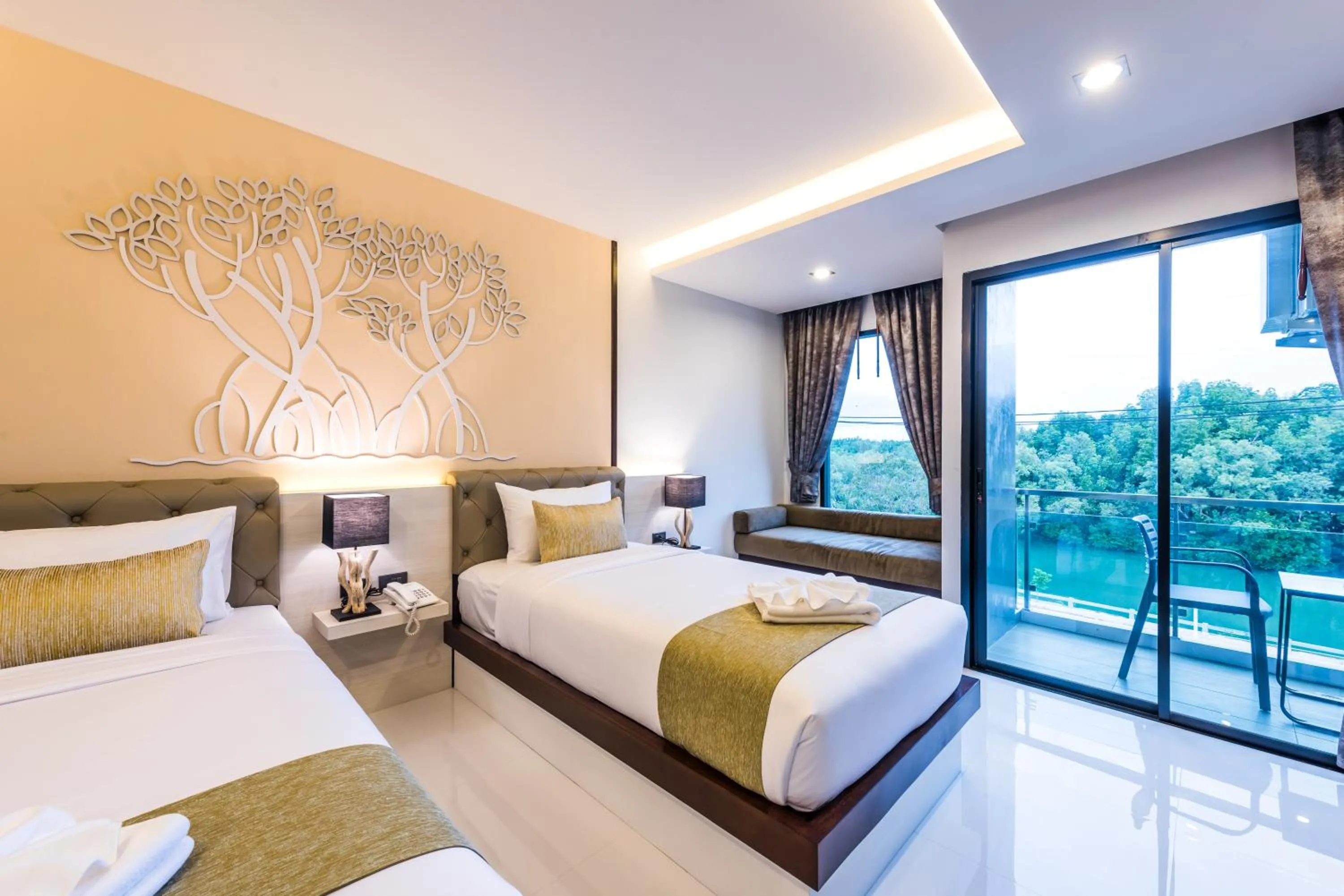 Bed in River Front Krabi Hotel