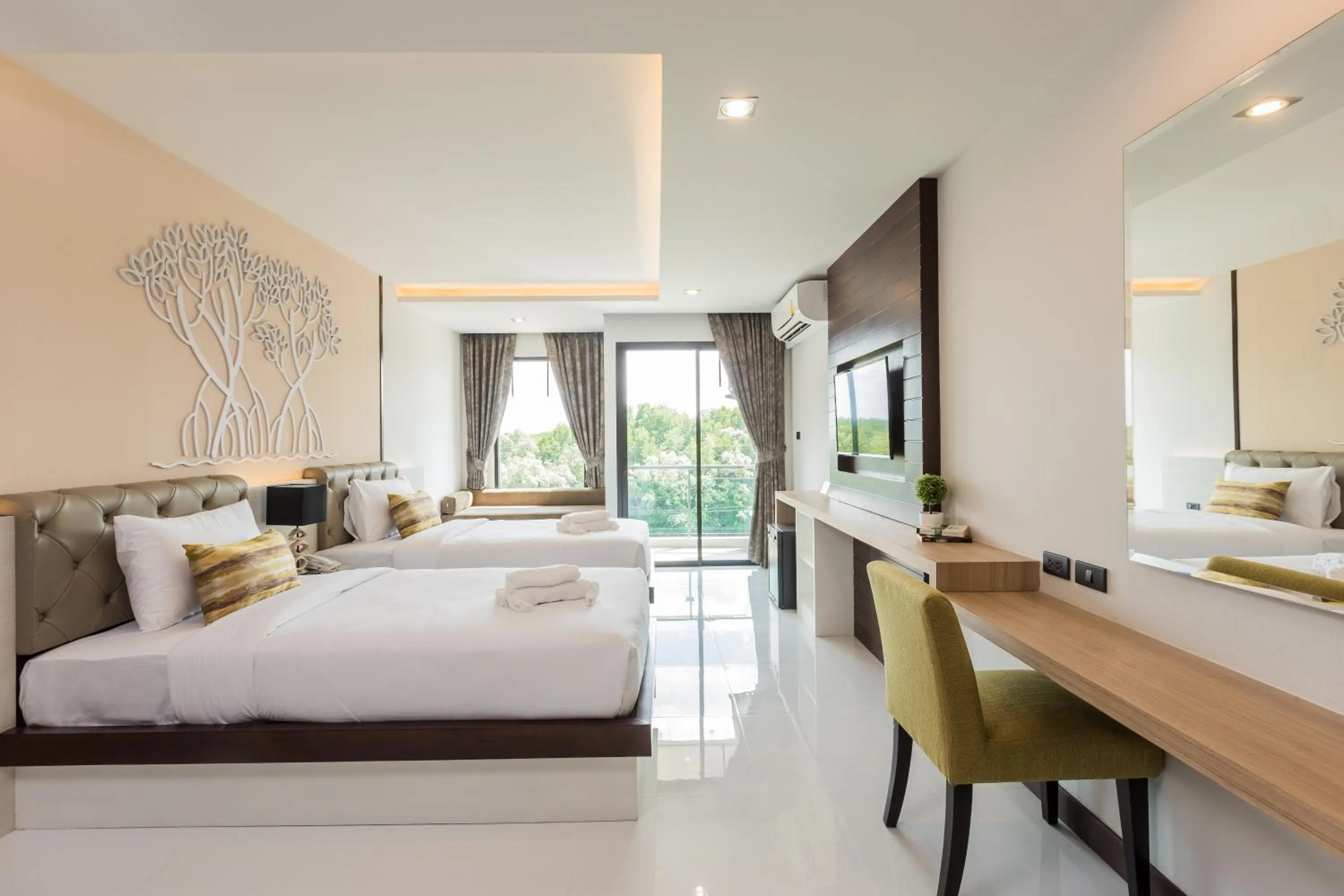 Bed in River Front Krabi Hotel