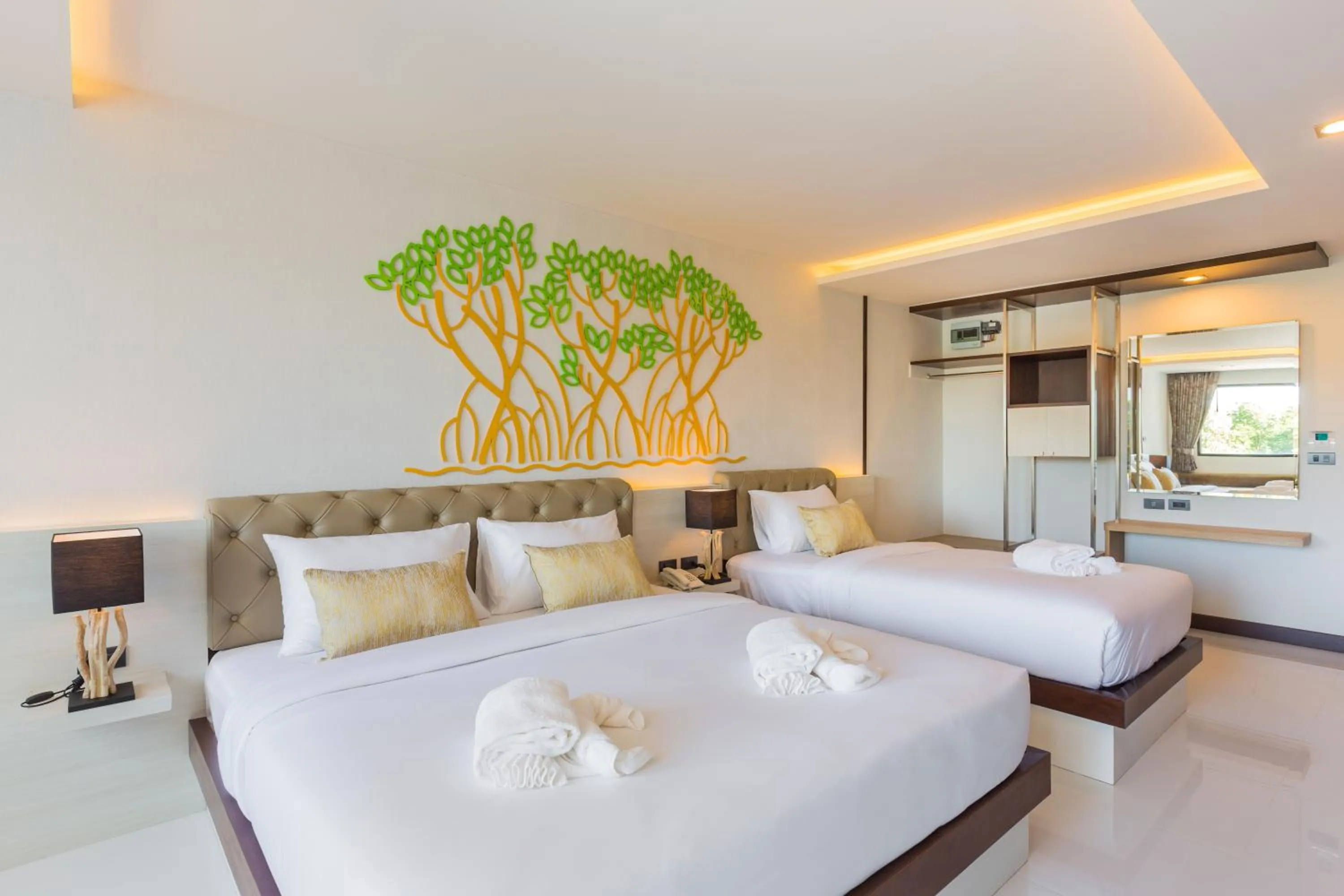 Bed in River Front Krabi Hotel