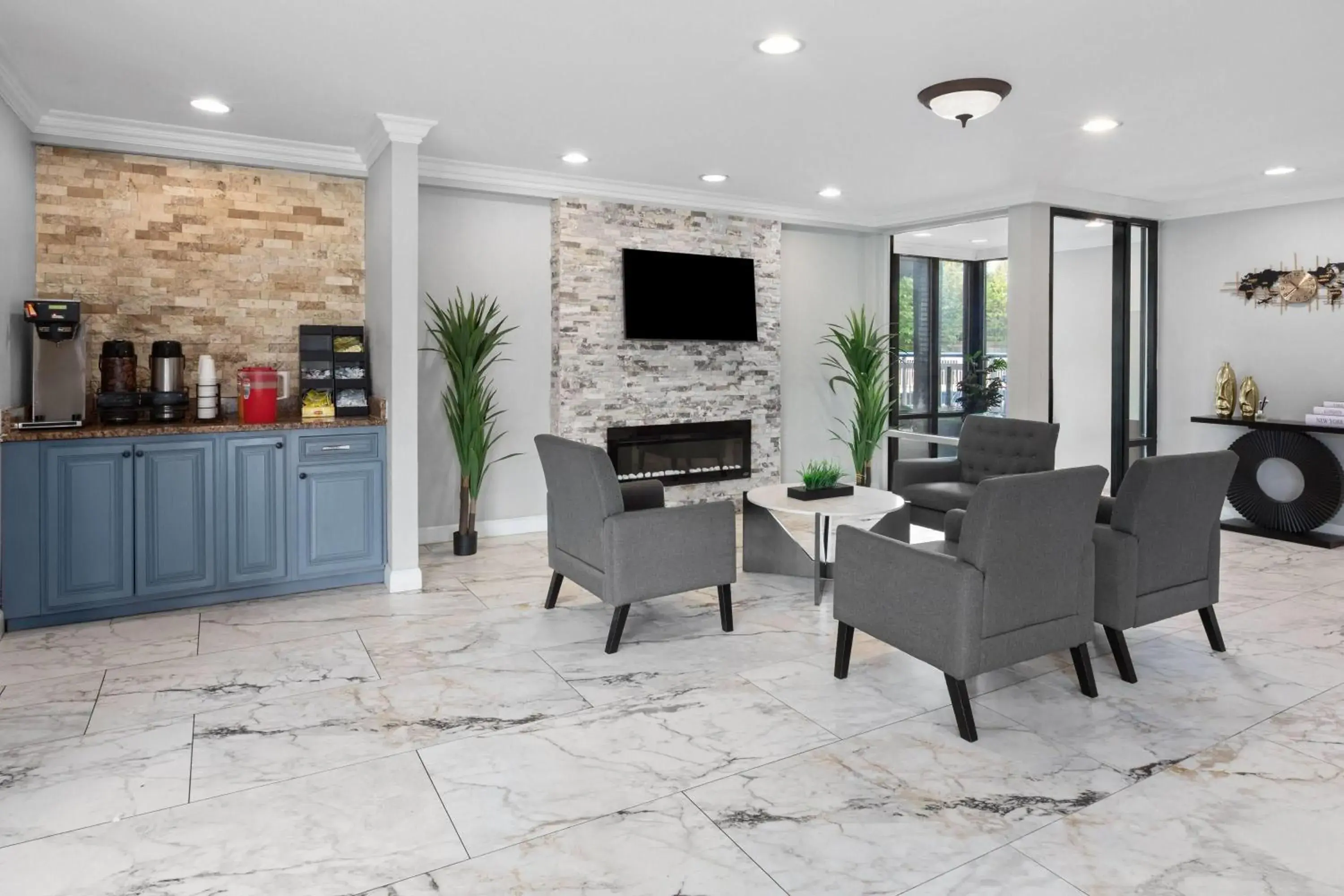 Lobby or reception in Howard Johnson by Wyndham Romulus Detroit Metro Airport Lobby or reception in Howard Johnson by Wyndham Romulus Detroit Metro Airport