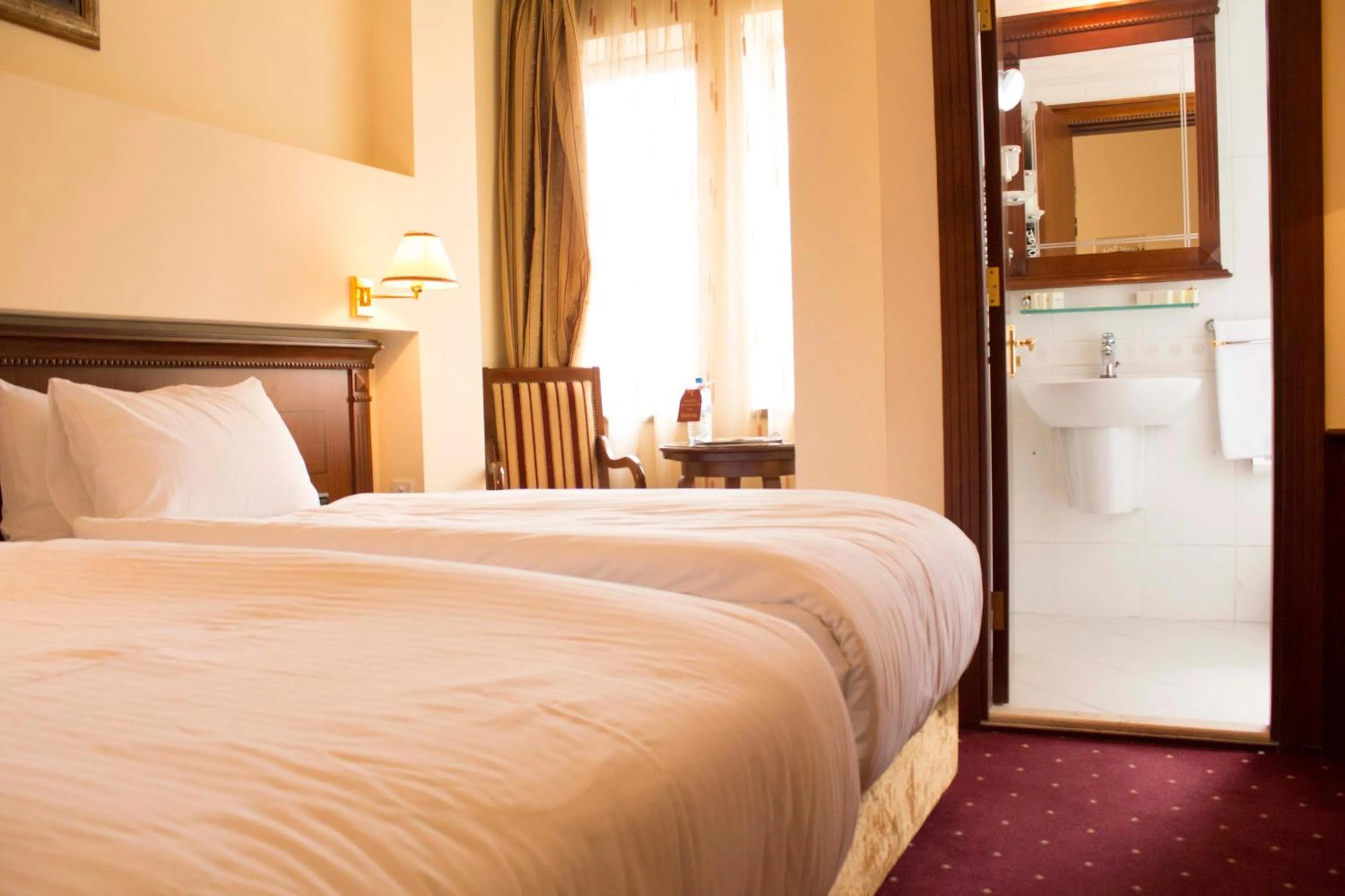 Bed in Stone Bridge Hotel