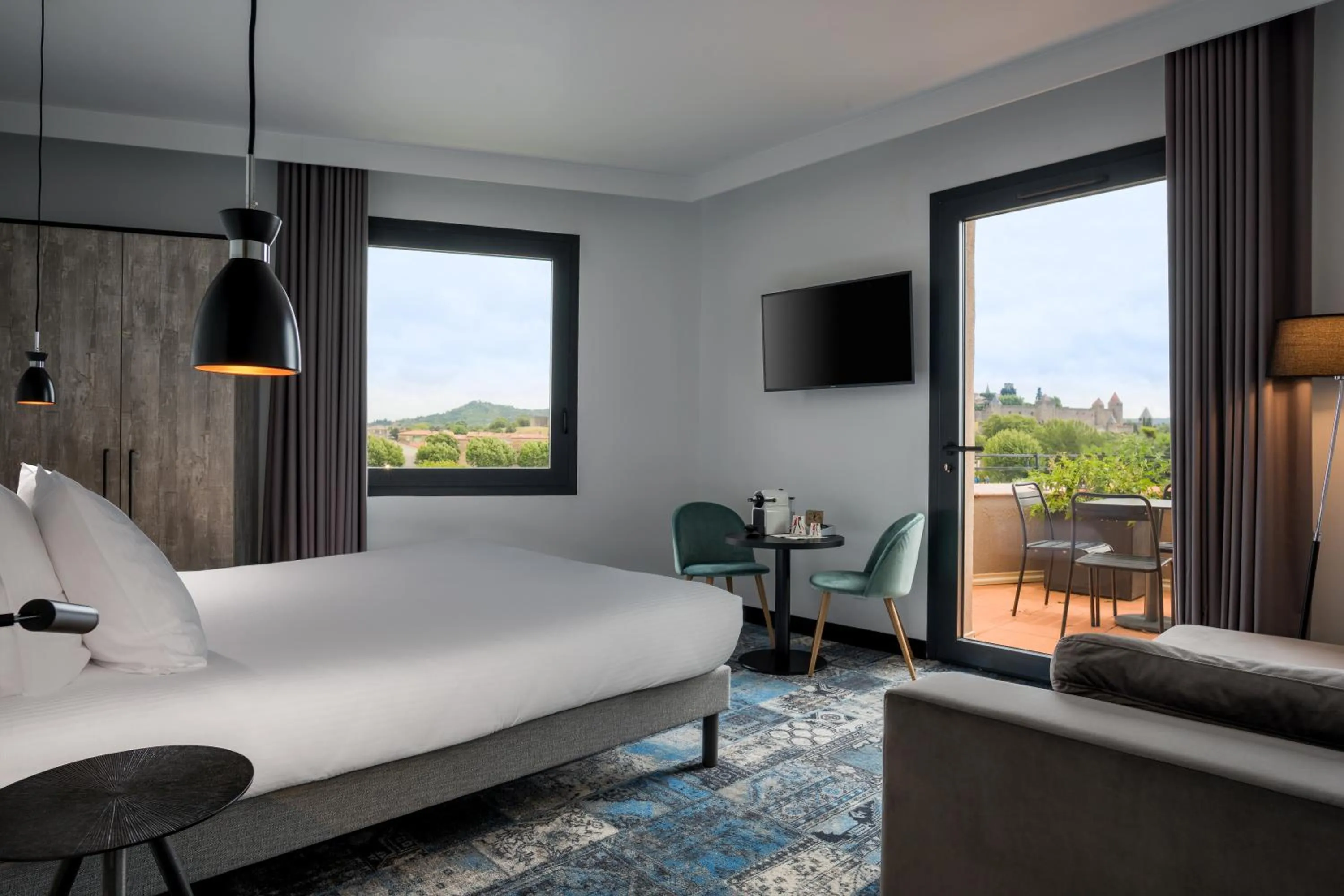 Bed in SOWELL HOTELS Les Chevaliers