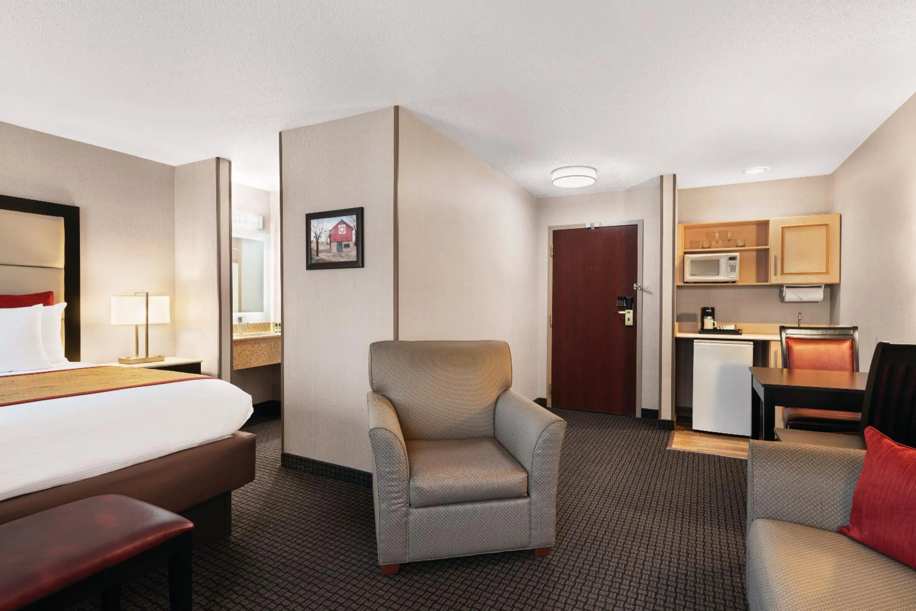 Seating area, Bed in Lancaster Suites