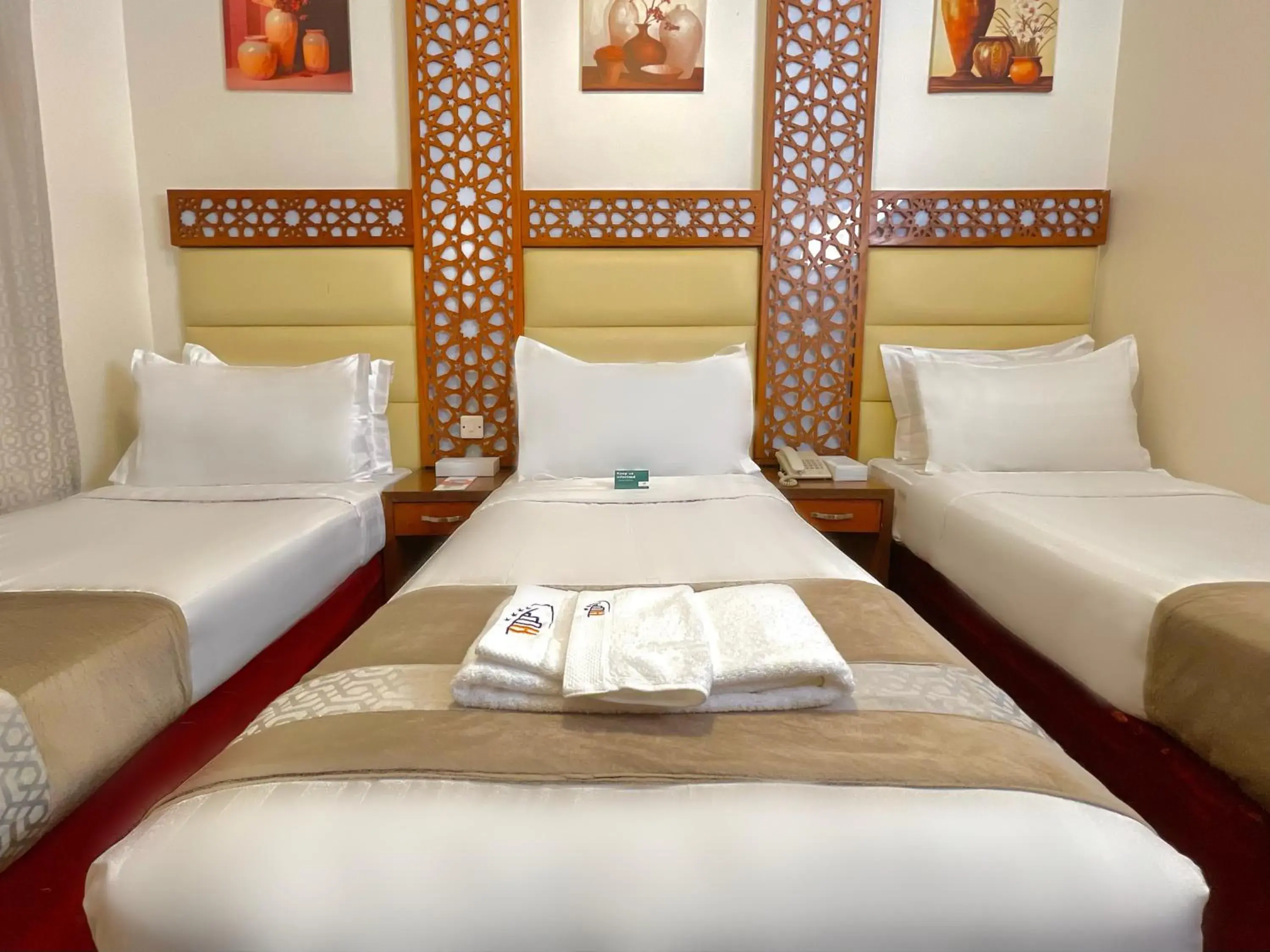 View (from property/room), Bed in Rawdhat Al Mukhtara Hotel View (from property/room), Bed in Rawdhat Al Mukhtara Hotel