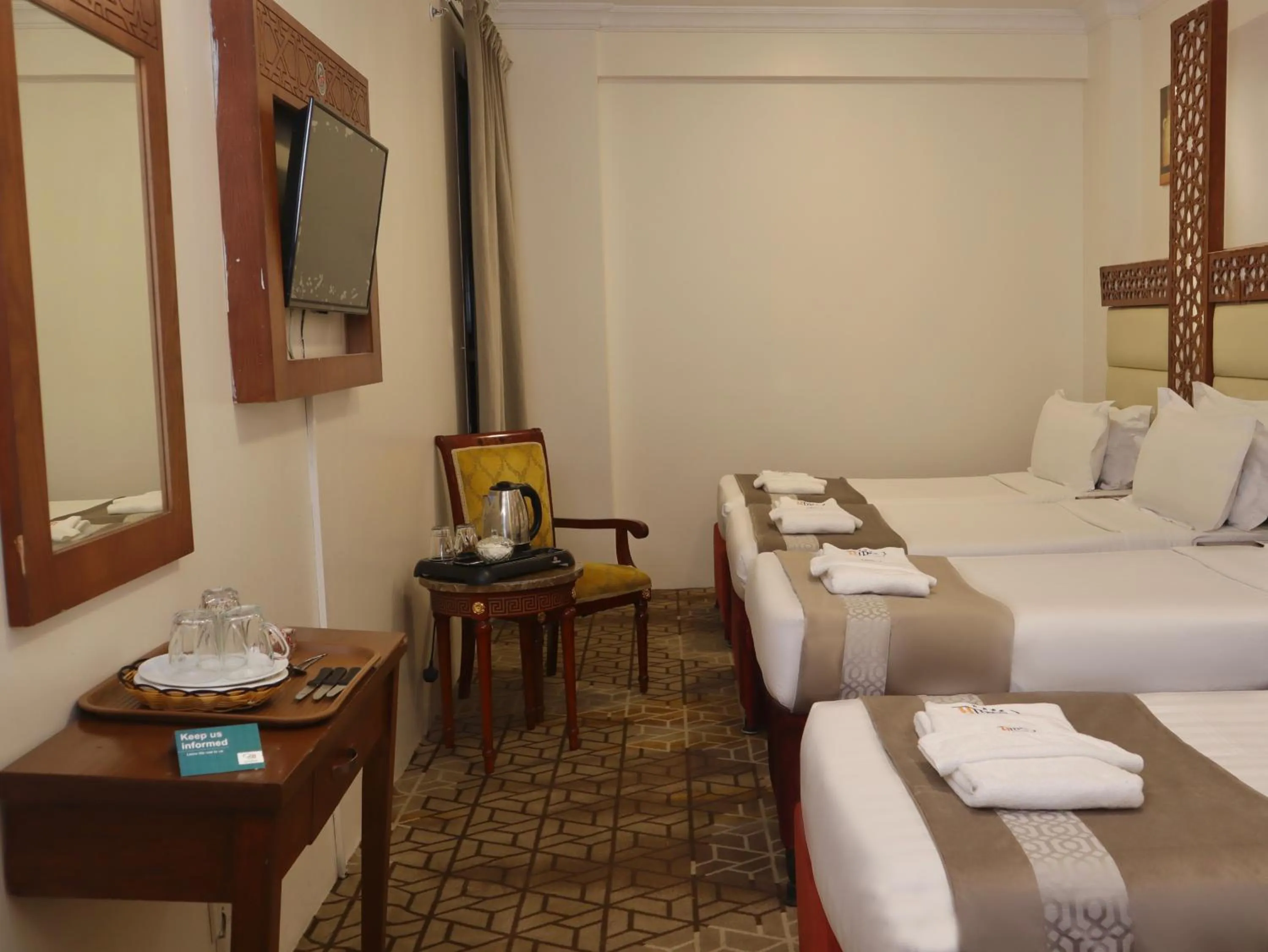 View (from property/room), Bed in Rawdhat Al Mukhtara Hotel