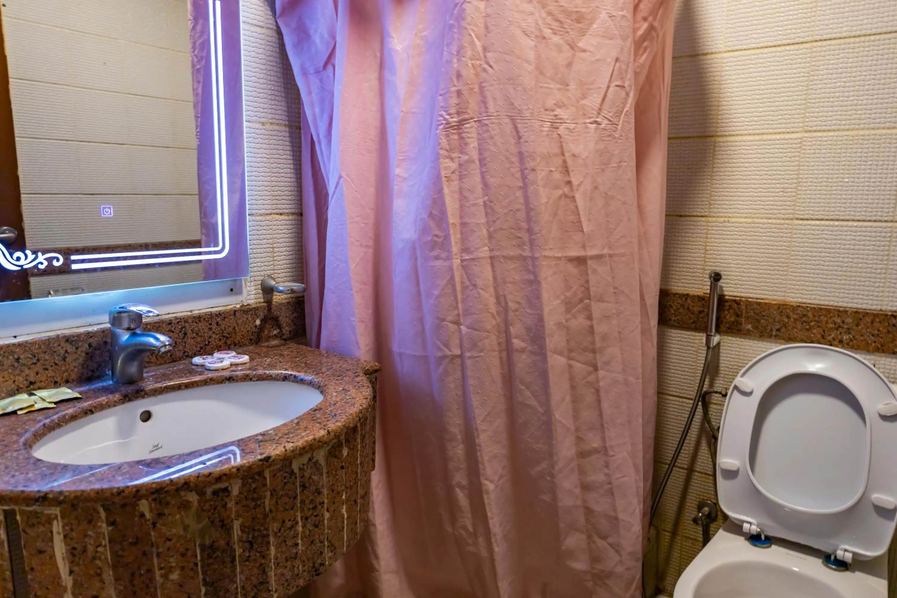 Bathroom in Rawdhat Al Mukhtara Hotel