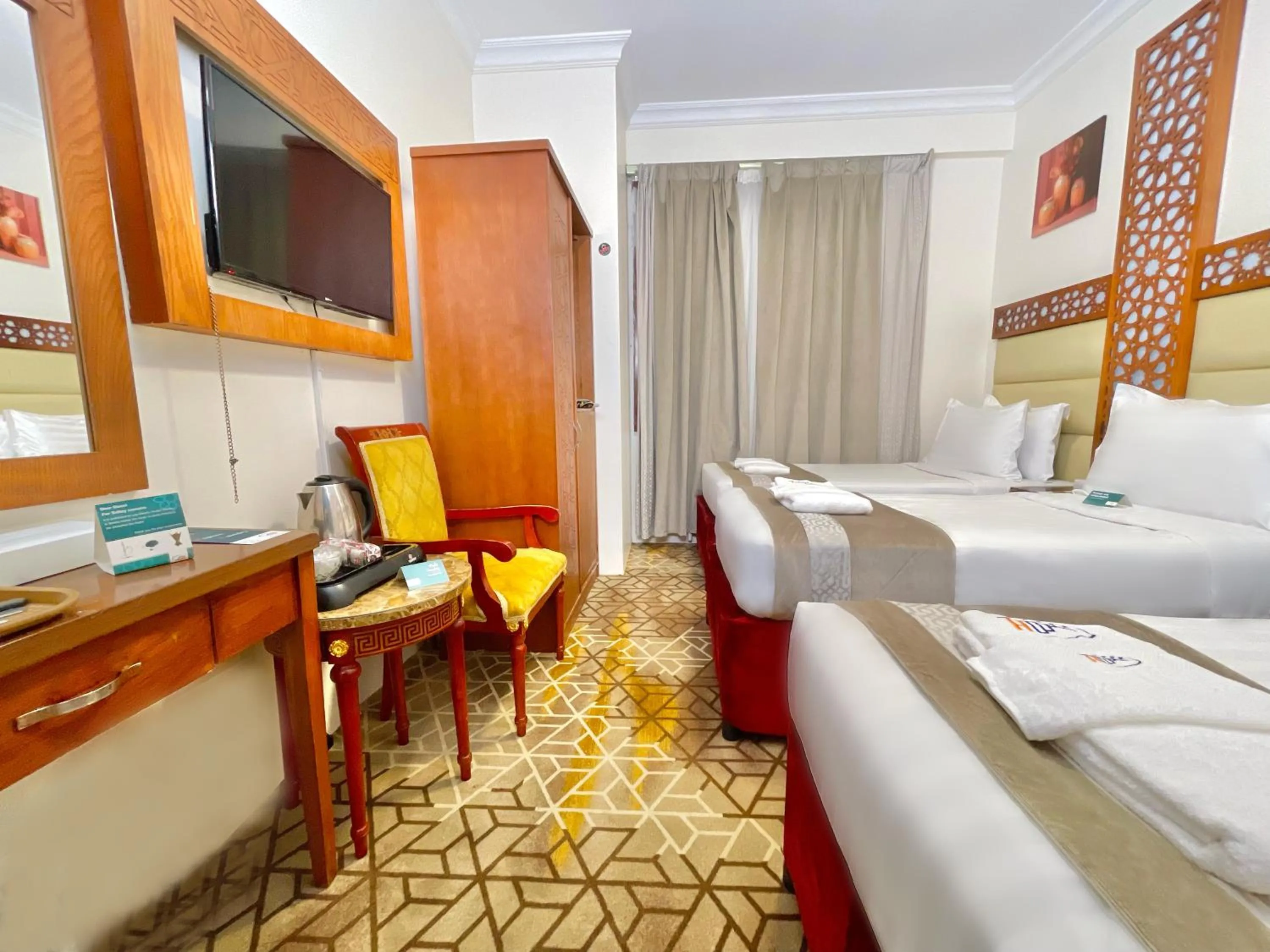 View (from property/room), Bed in Rawdhat Al Mukhtara Hotel