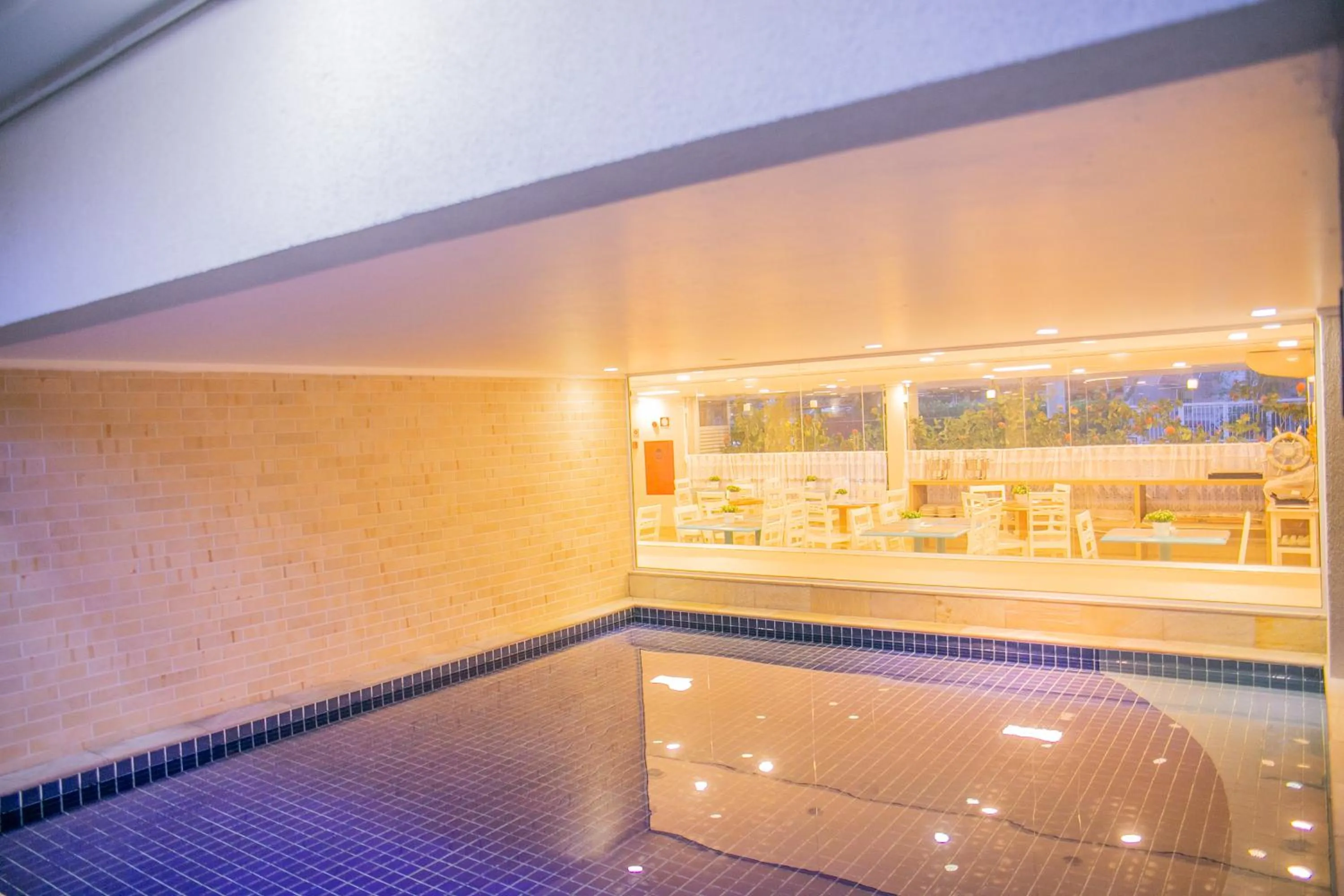 Swimming pool in Pousada Villa Di Enzo