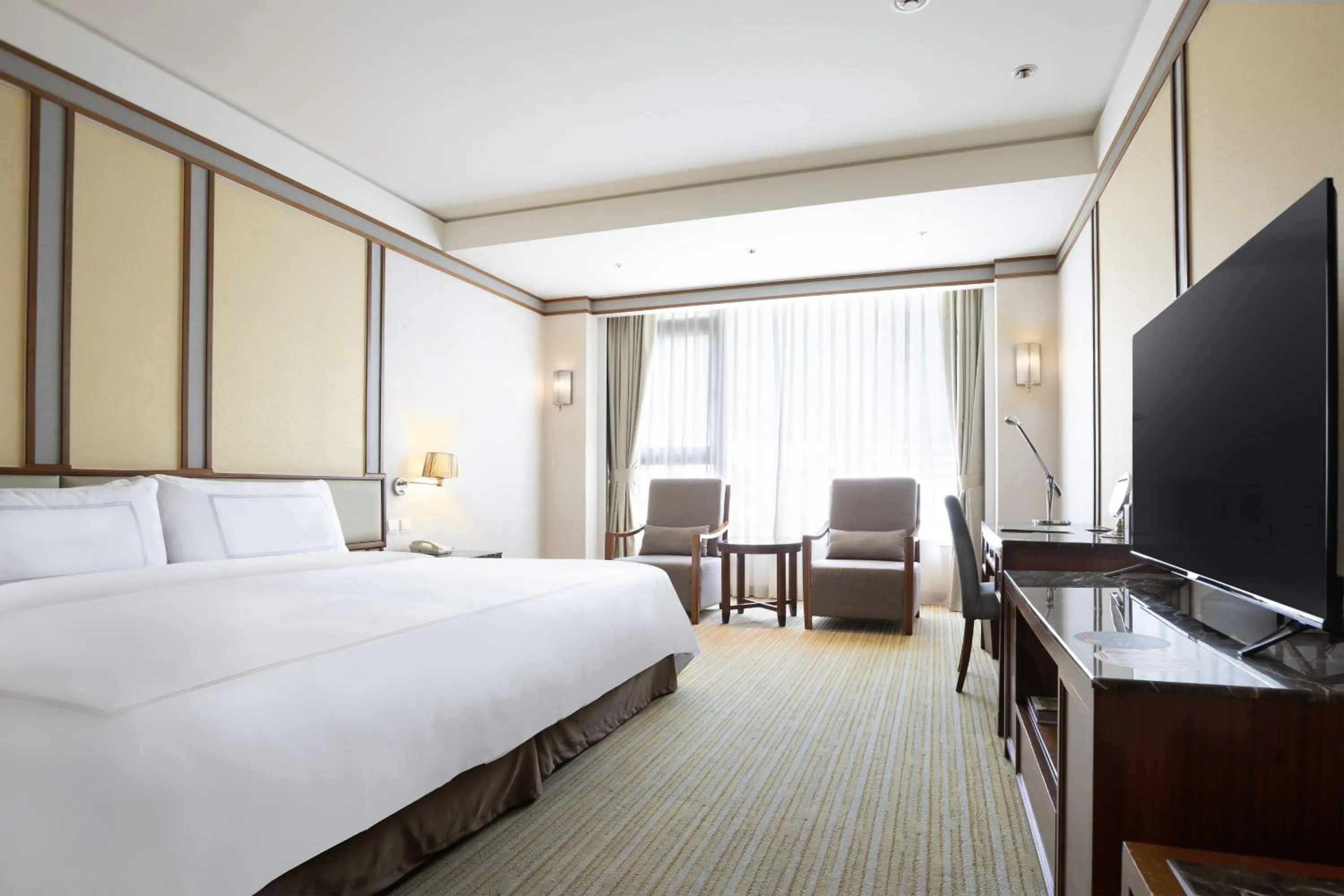 Bed in Evergreen Resort Hotel - Jiaosi