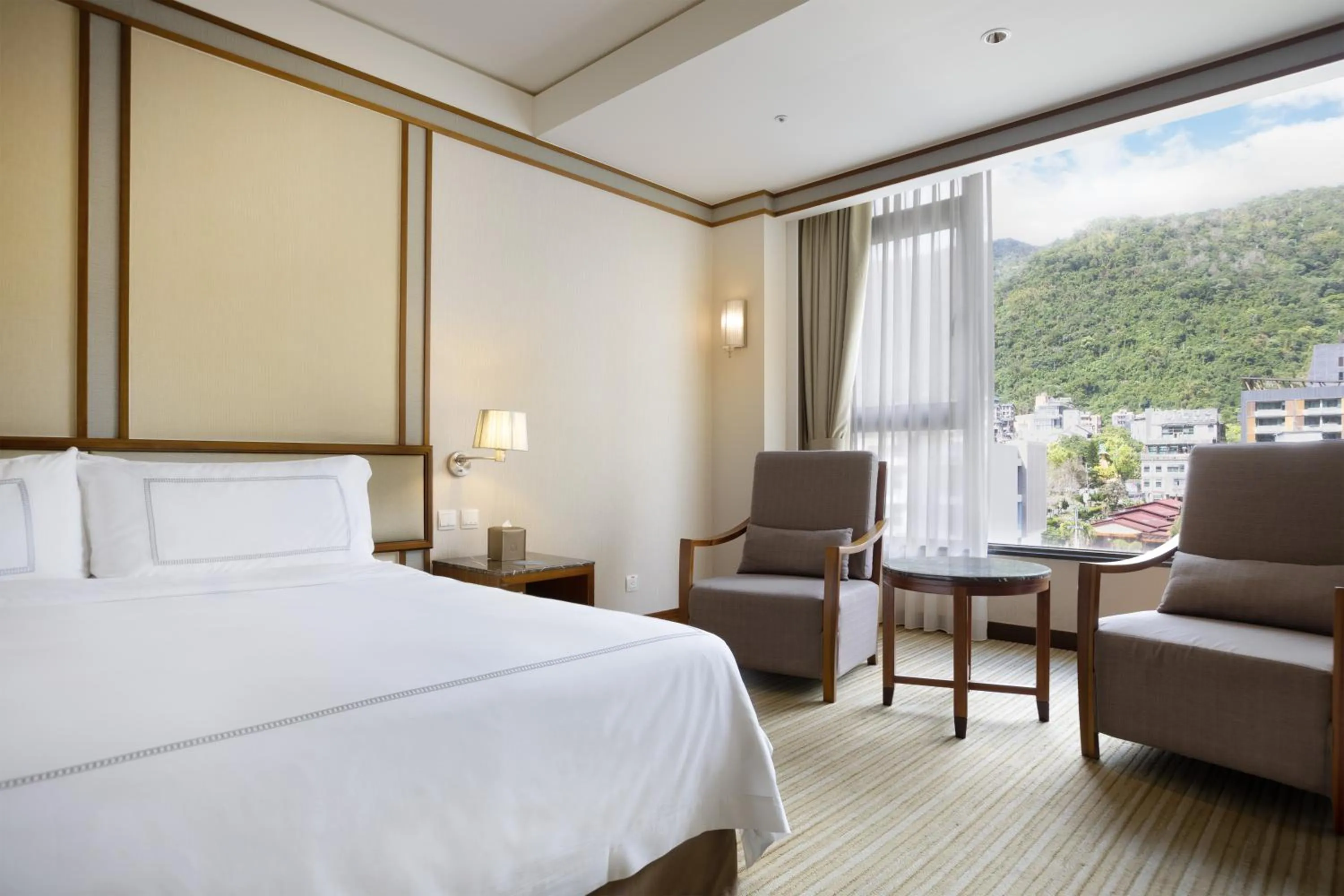 Bed in Evergreen Resort Hotel - Jiaosi