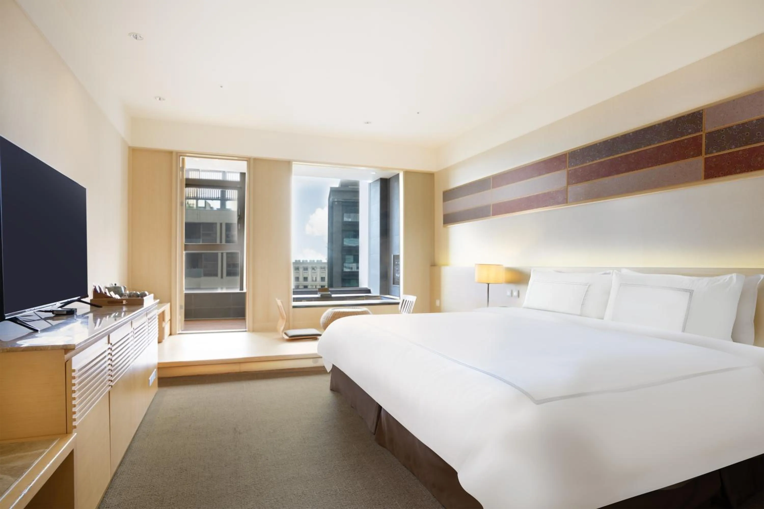 Bed in Evergreen Resort Hotel - Jiaosi