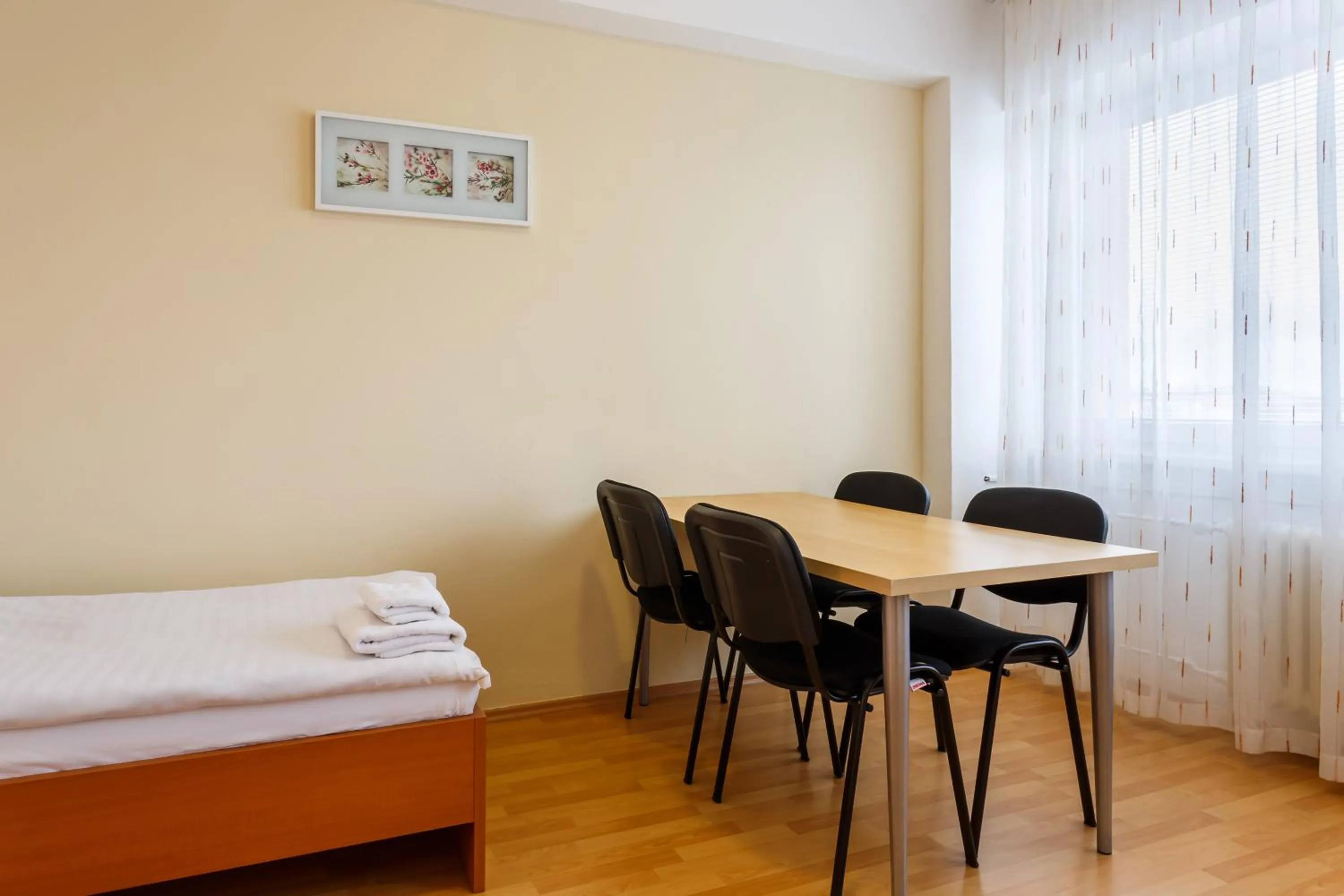 Living room, Bed in Hotel Veronika