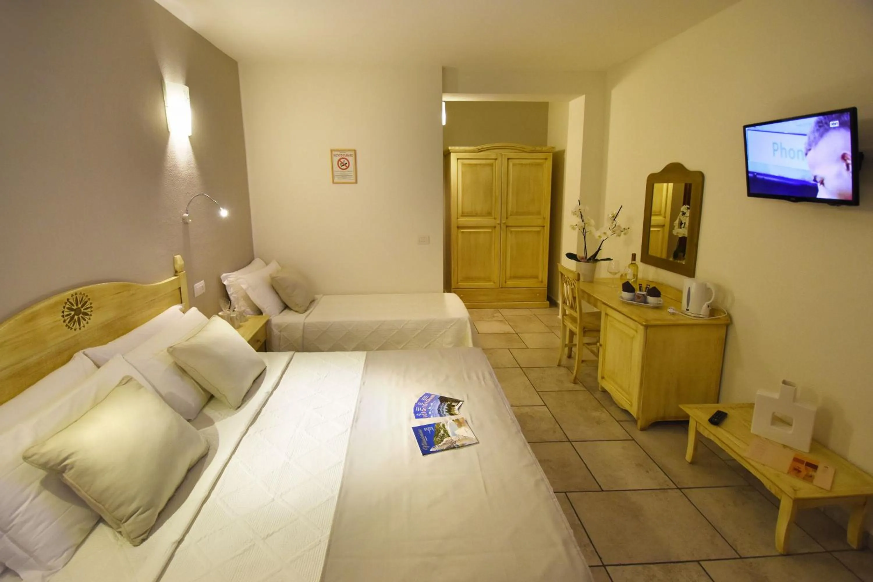 TV and multimedia, Bed in Hotel I Graniti