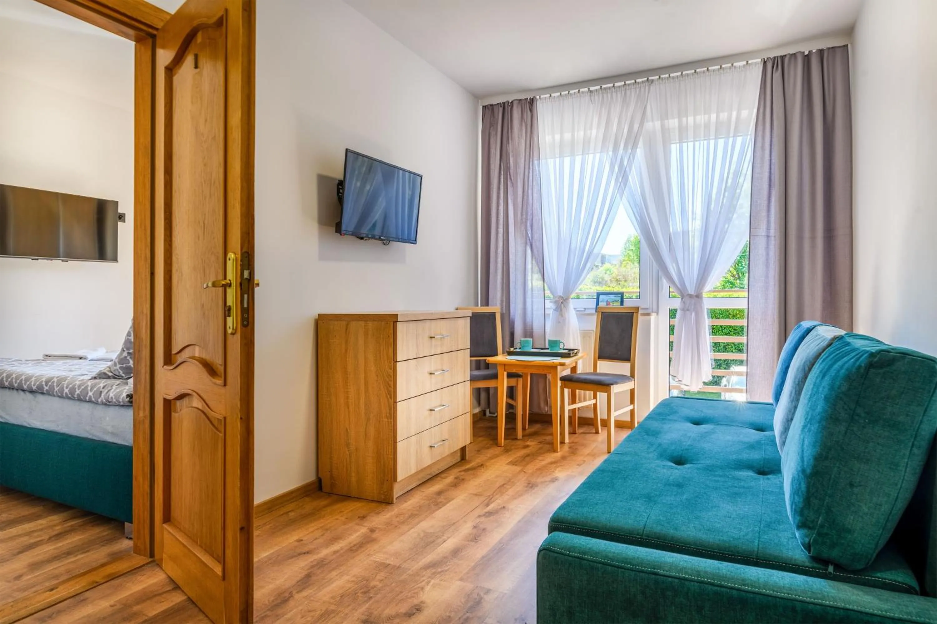 Living room, Bed in Dom Wypoczynkowy Arka