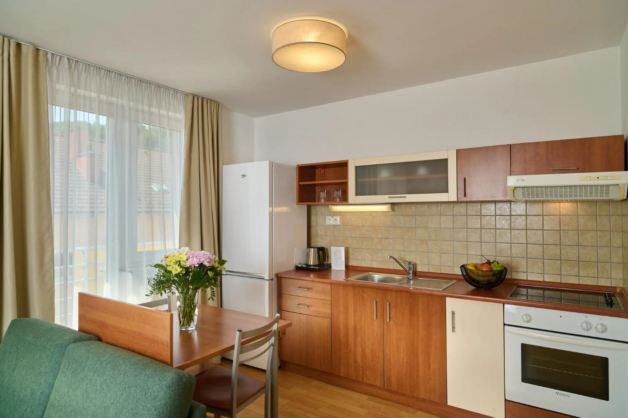 Kitchen or kitchenette in Urpí­n City Residence