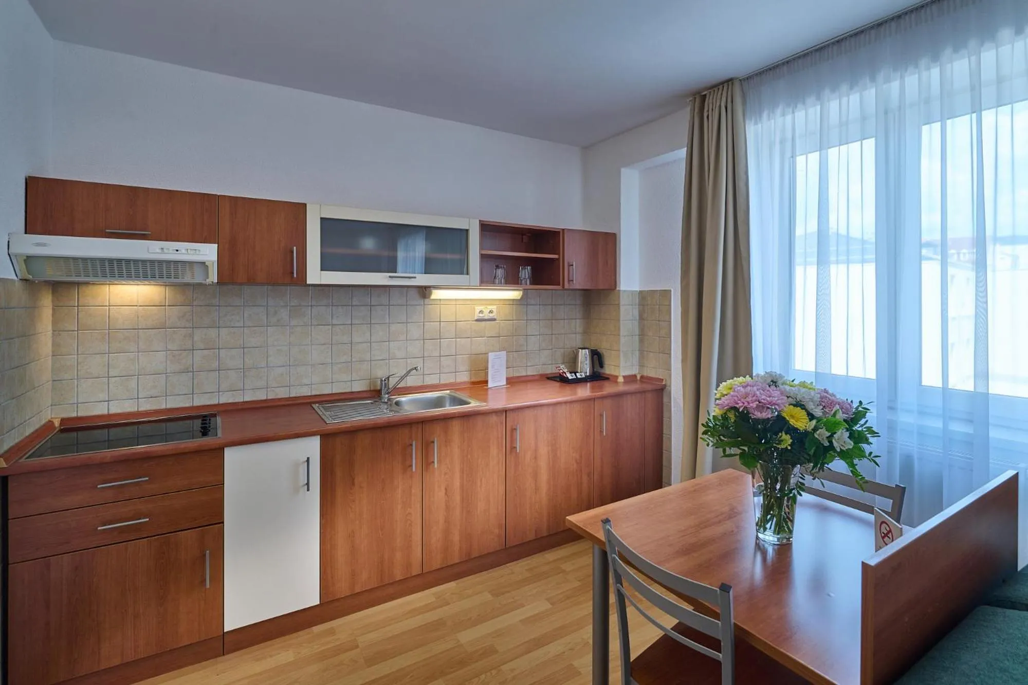 Kitchen or kitchenette in Urpí­n City Residence