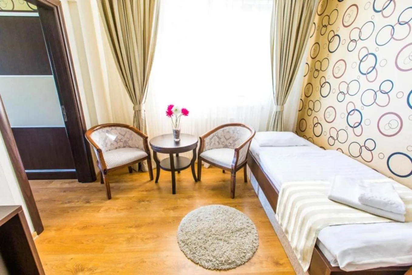 Photo of the whole room, Bed in Hotel Sun